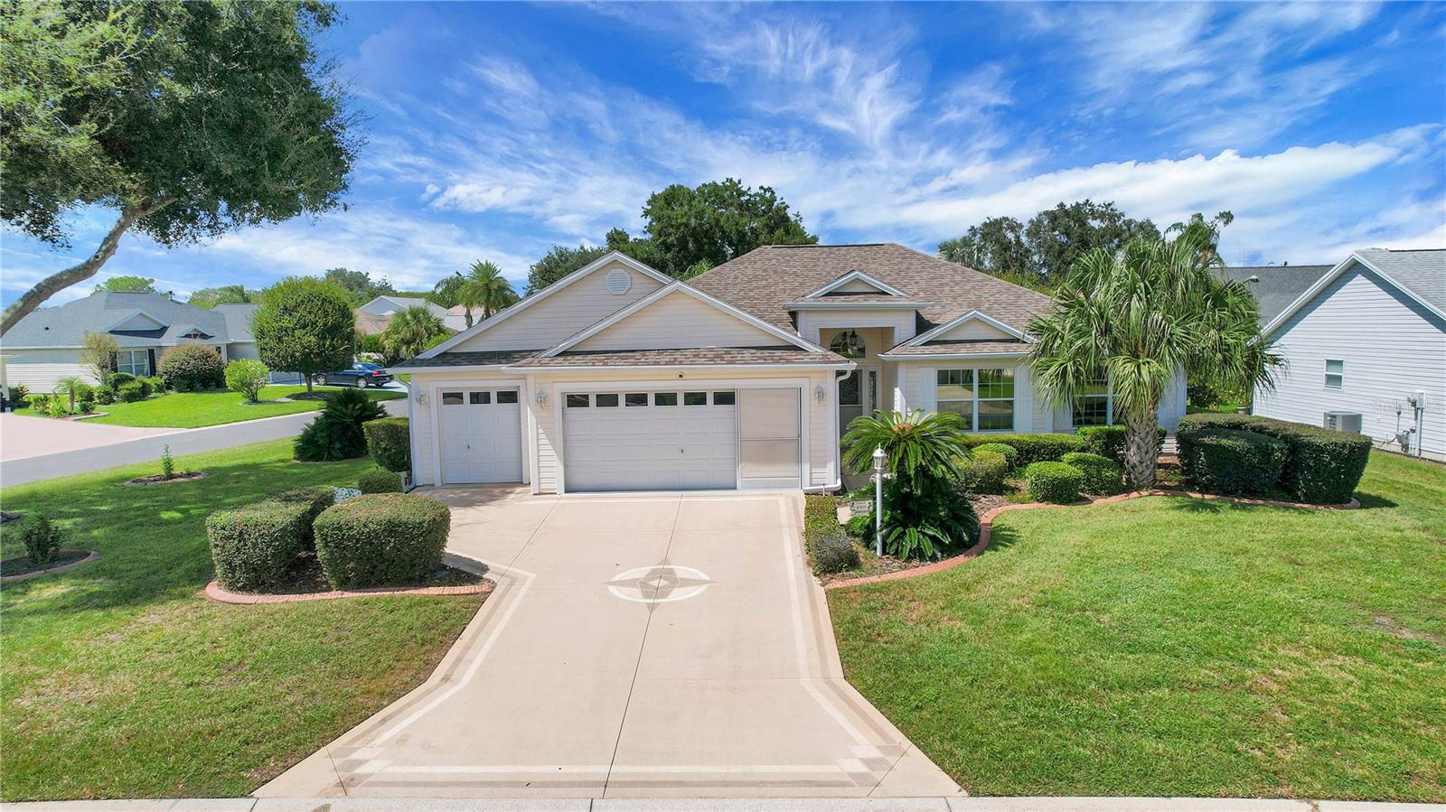 New Roof 06/2018 | New HVAC 2025 | 2 CAR + GOLF CART GARAGE| Village of Briar Meadow | 3 Bedrooms + bonus room | 2 Full Baths | GAS & Electric | New Mini Split in Master Bedroom & Lanai 2025 | Golf Cart INCLUDED | UPGRADED Pull Downs Stairs to Attic | Added Insulation | LOW Bond $1,554.00 | This Beautiful designer Oleander designer model is sure to please featuring 3 Bedrooms + Den 2 Car Garage + Golf Cart Garage (added bonus: Golf Cart Conveys), lovely Door with 2 side lights welcoming into the foyer.  The primary bedroom is spacious and can accommodate a King size bedroom suite Plus it has a Mini split for added comfort. The en-suite features a large walk in closet, a walk in shower, dual sinks and a new toilet.  The guest bedrooms are a good size and feature custom built in closets and the guest bedroom has a tub/shower combo with a new toilet. Soaring ceilings greet you as you enter the home.  The foyer features a large closet for added storage.  The living room and dining room have laminate flooring, while the foyer, laundry room and kitchen have tile flooring.  The large lanai (21 x 8.9) has a split unit and leads out to the oversized patio (14'11 x 8'11) which is great for entertaining or grilling! This home is in an ideal location; with a short golf cart ride you are just moments from the Springdale Pool, Dog Park, Mulberry Grove Pool & Regional Recreation Center, the Nancy Lopez Country Club, the new First Responders Regional Recreation Center with put put golf and Mulberry Grove Shopping Center offering Grocery, Drugstore, Banking, Medical, VA Center, Restaurants etc. You will also enjoy Lots of options for golfing, entertainment at the Savannah Center, dining at the Nancy Lopez Legacy Country Club, the Glen View Country Club, and situated conveniently to the 441/27 corridor for major shopping, restaurants and medical facilities. So, what are you waiting for… schedule your private home tour today so you can enjoy The Villages lifestyle soon!