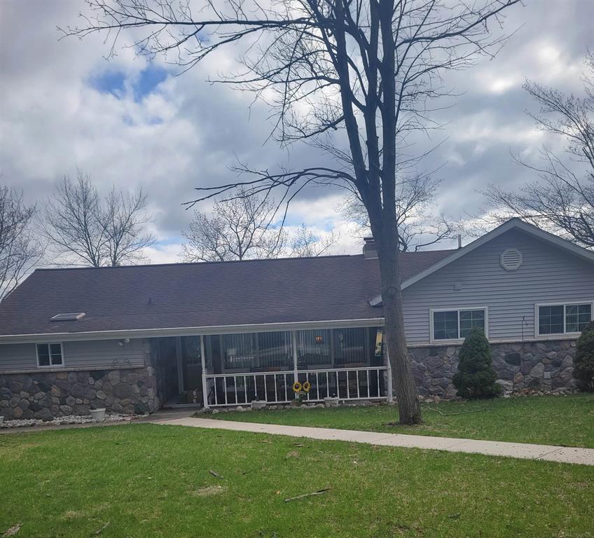 Lakefront Property! Be the next owner to enjoy this peaceful, tranquail home that features fabulous views out of every window. Blt into the hillside, all the lower level bedrooms can access the outdoors. If you don't need 4 bdrms use the big one in the lower levvl as a family rm or split into 2 bdrms. Triple pane Weatherseal windows & doorwalls thru out, bose speaker system is staying in liv rm, new well & pump (12 yrs old), new septic field(5yrs) steel seawall, ashphalt horseshoe drive. Forest Lake is a private all sports 330 acre lake. The Forest Lake association includes campground, pavilion, security, playground, clubhouse, boat launches and private beach. The Rifle River runs next to the community and is great for fishing, kayaking and rafting. For additional info regarding ammenities go to www.forestlakemi.org