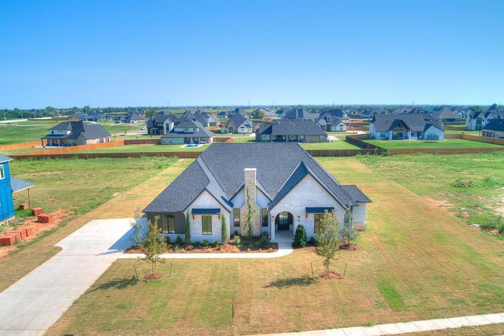 !!! MODEL HOME CLEARANCE !!! - $20K YOUR WAY| 4.25% Introductory Rate* | or | 5.5% Fixed Rate* | or | Refrigerator Upgrade to Luxury Side-by-Side | or | Complete Fencing | or | Closing Costs | or | Whatever You Imagine! |  - - - Welcome to ADDINGTON FARMS, where luxury meets comfort in this stunning one-level home! Featuring 4 spaciousbedrooms and 4 full baths, every room gets a dedicated bathroom creating convenience and privacy for every familymember or guest! This property boasts gorgeous finishes throughout such as authentic white oak hardwood floors andabundant built-ins. Enjoy your dedicated study with a cozy fireplace, perfect for remote work or relaxation. The expansivegame room is at the back of the floor plan and is ideal for entertaining as a flex space, bonus room, home theater or whatever youenvision! Culinary enthusiasts will love the incredible kitchen with custom wood cabinets, double ovens, a gas cooktopcomplete with a pasta faucet, and an impressive butler pantry—totaling 84 square feet of pantry space! Gather in theliving room under soaring vaulted ceilings beside the inviting gas log fireplace, enhanced by built-in lower cabinetsdesigned for audio/video components. This home offers everything you desire—luxury finishes, thoughtful design, andendless possibilities - all on a sprawling 1 acre lot in award-winning DEER CREEK SCHOOLS. Don’t miss out on making it yours! (*Special rates subject to qualifying)