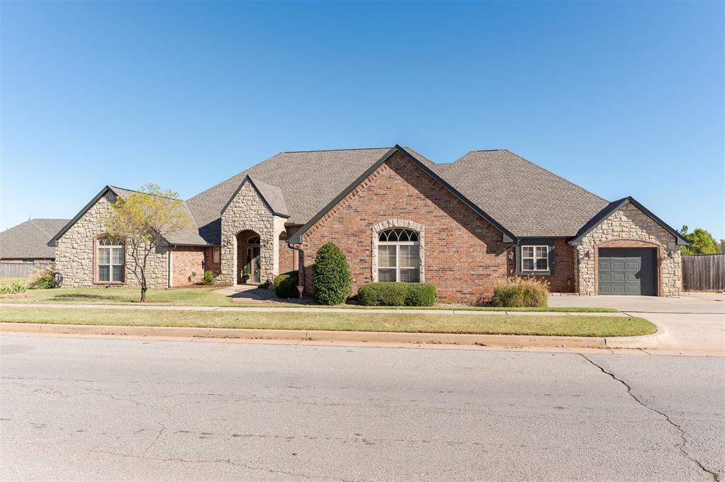 Welcome to your dream home in Barrington on a massive corner lot bursting with space, style, and features perfect for someone who loves to entertain!  With 4 bedrooms, 1 with the potential for a mother-in-law suite, 3.5 baths, 4 living areas, office, game room, and home theatre this split floor plan has room for everyone to live, work, and play. Step inside to find a grand formal dining room and dedicated office with built-ins. The kitchen is a culinary dream, with stainless steel appliances, 4 ovens, granite countertops, and a walk-in pantry, all flowing seamlessly into the main living room with a gas log fireplace. There is an additional living space off the main that would be perfect for a music room or sitting room. The primary suite offers ample space in the bedroom, jetted tub, walk-in shower, dual vanities, and a massive walk-in closet. Secondary bedrooms are paired with their own living space, while the game room includes a kitchenette and the perfect amount of space for a billiard's table. Right off of the bonus room is the theatre room. The laundry room provides an extra level of storage with all of it's built-ins and space. Other features of this home include fresh paint throughout the main areas, hidden above ground safe room/storm shelter in the hall closet off the entry, new roof and gutters (2023), 2 water heaters (one recently replaces & one brand new 4/25), 3 AC units and AMPLE storage. A construction company has confirmed that a pool is doable off of the back patio if you want to take this home to the next level on the entertainment scale! Don't wait, scheduled your showing today!