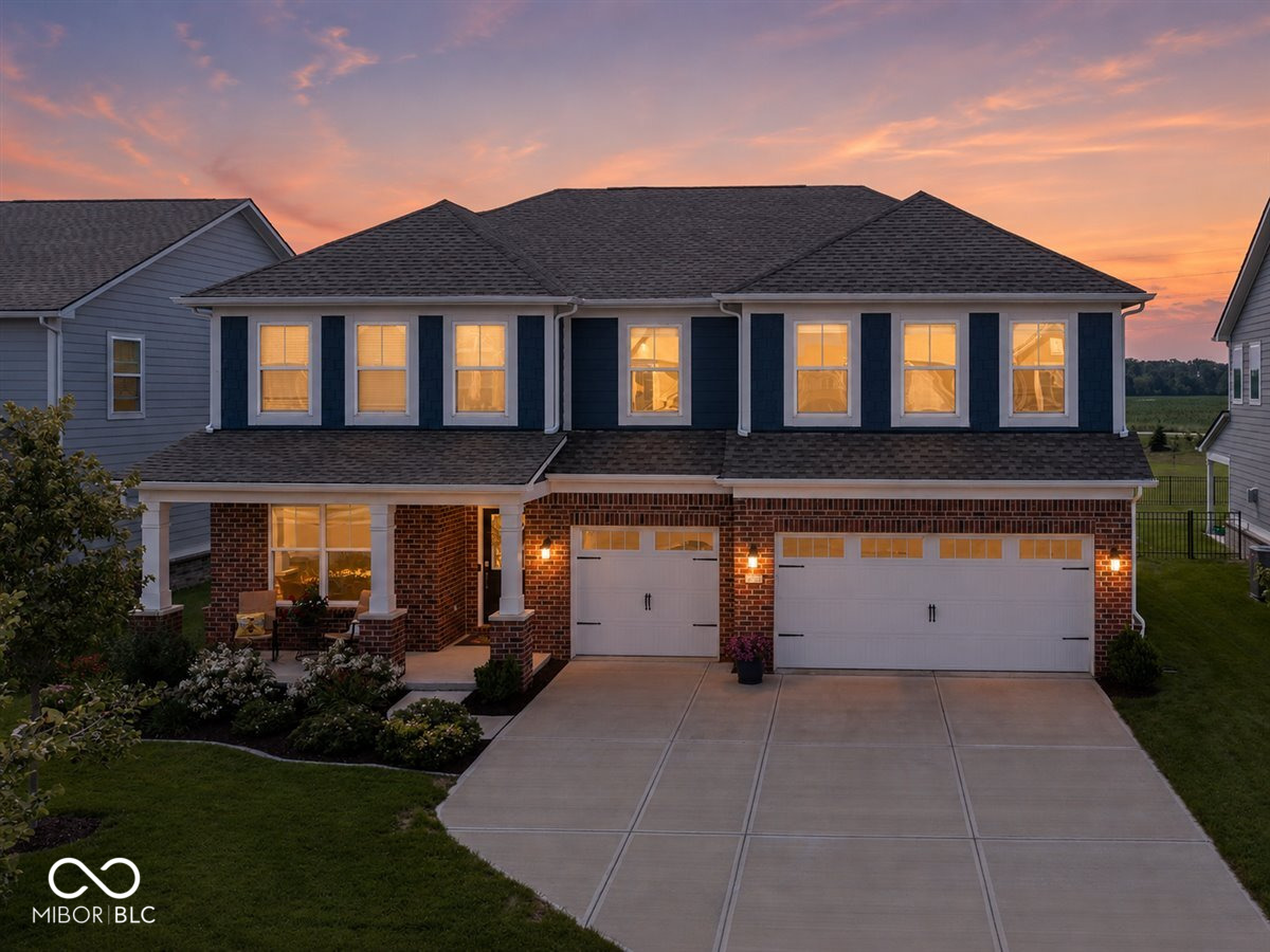 Welcome to this Brilliantly Designed 5 BD, 3 Full BA Hm complete w/Private Hm Office w/French Doors + Sunroom + Loft combining modern style, functional living + exceptional space in one of Fishers' most sought-after communities w/incredible HOA Amenities + steps to Flat Fork Creek Park! Open Concept Floor Plan w/Luxury Vinyl Plank Floors throughout Main + a bright Sunroom w/spacious Great Rm + Dining Spaces filled w/natural light! Gourmet Kitchen showcases SS Appls w/Gas Range, Quartz Counters + Center Island w/Breakfast Bar + classic Subway Tile Backsplash & abundant Cabinetry & Counter Space!  Main-Level In-Law Suite + Full BA provides the perfect space for Guests or Multi-Generational Living while the Mudroom off the 3-Car Garage adds everyday convenience! Upstairs, you'll find a Spacious Loft w/Endless Possibilities + 4 generously sized BD's + Laundry Rm w/Built-in Cabinetry + Folding Counter! Owner's Suite w/Dual Vanity, Walk-In Shower, Spacious WIC! Enjoy outdoor living in the large Fncd Bkyd w/Covered Patio + Extended Paver Patio & Gorgeous Landscaping ideal for relaxing or entertaining! You'll love the Walking Trails connected to Flat Fork Creek Park, Multiple Ponds, Playgrounds + Community Pool! This nearly new home offers the perfect blend of comfort, style + an outstanding location w/Award Winning HSE Schools!