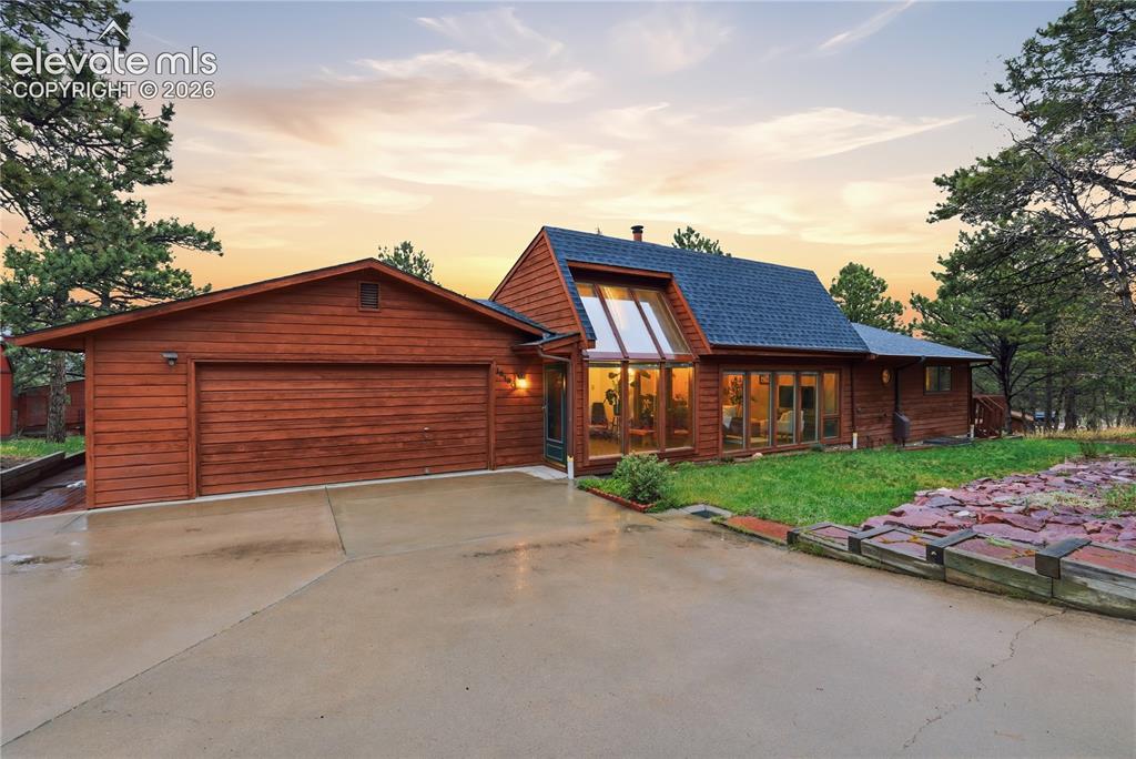 Nestled among the pines on a picturesque 1-acre lot in Monument, this spacious 6-bedroom, 4-bath home offers the perfect blend of mountain charm, privacy, and flexibility. With over 3,300 square feet of living space and beautiful mountain views, this property delivers room to spread out both inside and out. Large windows invite natural light into the home while the inviting living spaces and fireplace create a warm, comfortable atmosphere ideal for everyday living or entertaining. The finished basement adds valuable additional living space with endless possibilities for recreation, hobbies, or multi-generational living. One of the standout features is the private mother-in-law suite, offering exceptional versatility for extended family, guests, or independent living. Outside, enjoy the peaceful setting of mature trees, open space, and the serenity for which Monument living is known. The prime location feels tucked away while remaining convenient to local amenities, this property presents a rare opportunity to enjoy Colorado living with space, comfort, and versatility all in one remarkable home. This home has been thoughtfully upgraded with major mechanical, safety, and cosmetic improvements throughout. Recent updates include a new shingled roof, new two-stage furnace in the main home, additional guest suite furnace, serviced HVAC systems, whole house fan, remodeled laundry room and hallway bath, and included Samsung front-load washer and dryer. The garage has been insulated, drywalled, painted, and equipped with a new opener system. Interior enhancements feature updated lighting, ceiling fans, fresh upstairs paint, new exterior doors, and modernized outlets and switches. Outside, professional wildfire mitigation, maintained defensible space, deck safety improvements, exterior flood lighting, and a garden water collection system add lasting value and peace of mind.