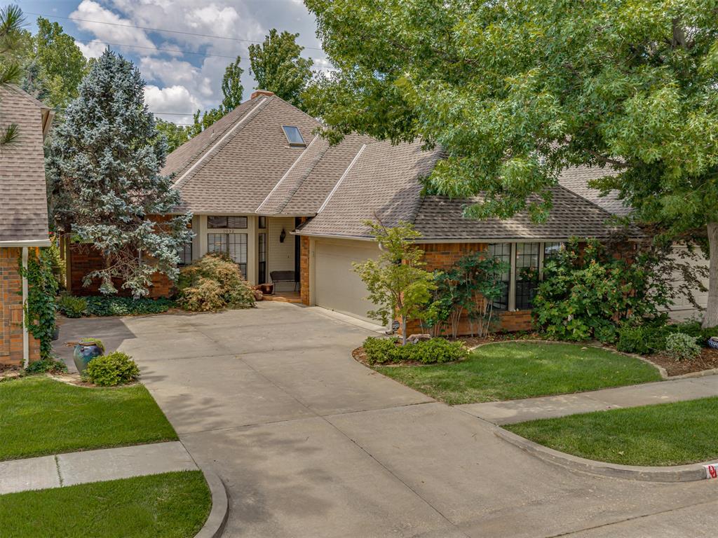 Beautiful home in Canadian Trails addition located 1.6 miles(5 min drive) from The University of Oklahoma. This single-story home is surrounded by trees, patios, and a greenbelt. Large kitchen offers lots of beautiful cabinets, gas range in island, large pantry,  vaulted ceiling, door to private patio with natural gas hook-up for a grill, sink window opening into formal dining area and living room. Kitchen has wall oven, built-in microwave, tile counters, appliance garage, under-cabinet lighting, and breakfast dining area. Large living room has true wood flooring, gas fireplace, vaulted ceiling, wet bar adjoining the Florida room with nearly floor-to-ceiling windows and great views of the green belt, patios and gardens. Primary Bedroom also has a vaulted ceiling, walk-in closet with built-in dresser, wood floors, and its own patio. Great views in this room too! Primary Bathroom has a whirlpool tub, walk-in shower, skylight, water closet, separate vanities, and access to the Laundry room through a pocket door. The laundry room also gives access to the guest bedroom. The guest bedroom has a nice-sized closet and desk. Garage is oversized with storage at rear and in-ground storm cellar. HOA benefits are club house/pool access and lawn care. No mowing for you!