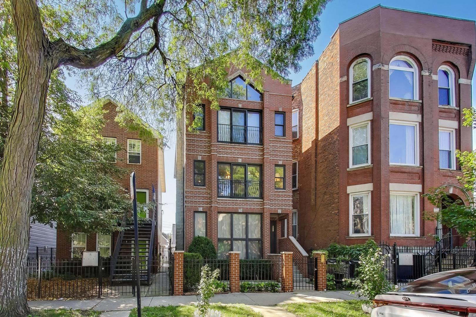Live in the best pocket of Humboldt Park-just one block from the park yet tucked away on a quiet, tree-lined street. This meticulously maintained 2 bed, 2 bath condo offers the perfect mix of comfort, convenience, and location. The spacious layout features hardwood floors in the main living areas, cozy carpet in the bedrooms, and a welcoming wood burning fireplace at the heart of the home. The kitchen is equipped with stainless steel appliances, plenty of storage-including a rare pantry-and opens seamlessly to the living space, making it ideal for both everyday living and entertaining. The massive primary suite is a true retreat, with incredible natural light streaming through a floor-to-ceiling sliding door that opens to a private balcony. There's ample room for a king bed plus extra furniture, a full wall of closets, and a spa-like ensuite with a soaking tub and separate shower. Additional highlights include in-unit laundry, a gated parking space with an EV charging outlet, and a well-managed building with a proactive association. Enjoy unbeatable access to the park for morning runs or weekend picnics, and walk to all the restaurants, coffee shops, and nightlife along the California Corridor: The Hi-Lo. Spinning J, La Boulangerie, Segnatore, Rootstock and more.