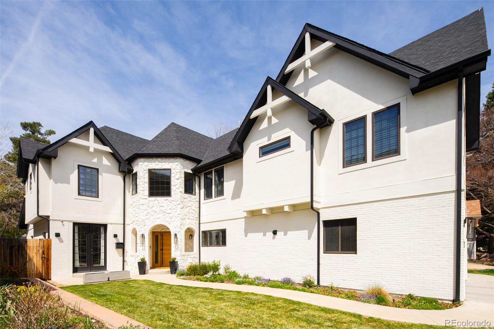 Perfectly poised in the coveted Crestmoor neighborhood, this refined residence offers an exceptional blend of stylish elegance and functionality. Light-filled and move-in ready, this stunning home boasts a spacious layout with a main floor home office, a large chef’s kitchen, a dining area and a welcoming living room with a fireplace. A private en-suite bedroom, guest powder room and laundry complete the main level. Upstairs, discover a luxurious primary suite with vaulted ceilings, a walk-in closet and a spa-like bathroom, along with three generously sized secondary bedrooms — one en-suite and two sharing a dual-entry bathroom. The finished basement offers fantastic flex space, a wet bar, a powder room and an additional en-suite bedroom with incredible storage. Outside, the entertainer’s backyard features a terrace with a built-in grill and lush green space perfect for pets. Enjoy seamless access to Crestmoor Park, schools, shopping, dining and everything this premier location has to offer.