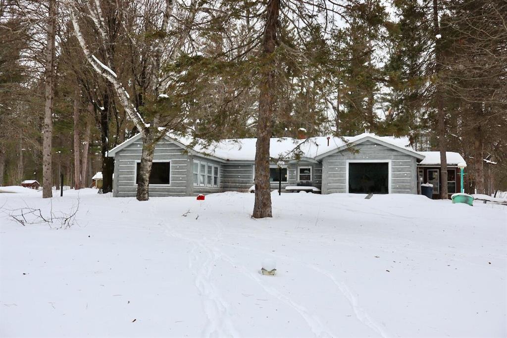 This 117.25?? acre property in Oscoda County offers a combination of size, setting and recreational value in an area where properties like this are becoming increasingly difficult to find. With substantial acreage, existing improvements and close proximity to one of Michigan's most iconic trout rivers, it delivers a true Up North experience without compromise. Located just over a half mile from the Au Sable River, near the well-known Parmalee Bridge, the property provides quick access to renowned brown and rainbow trout fishing while maintaining a private, scenic setting of its own.The land is defined by a strong mix of mature pine and maple timber that creates cover, privacy, and a classic northern Michigan forest feel. A trail system runs throughout the property, providing efficient access for hunting, land management and recreation. The deer sign is evident across the acreage, with heavily used travel routes and multiple rubs observed along natural movement corridors. There are several areas would offer the opportunity for food plot development or targeted habitat improvements, allowing a future owner to further strengthen the property's hunting layout.On the west side of the property, a pond adds both visual interest and function, complemented by a small picnic area tucked within the timber that provides a quiet place to gather and unwind. The size and configuration of the acreage support a wide range of year-round recreational uses, including whitetail and turkey hunting, trail riding, snowmobiling and general outdoor enjoyment. State land is located across the road to the south, which further enhances the property's appeal, offering convenient access to additional public hunting and recreational opportunities, while the property itself maintains a secluded, manageable feel well-suited for long-term recreational ownership.There is an existing cabin that offers use as a recreational camp and includes all the basic utilities, though some updating and finishing work would be required to bring it to full l