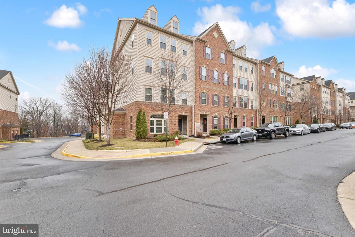 New Price!Beautifully maintained end-unit condo in the highly sought-after Virginia Manor section of Dulles Farms. This light-filled home offers the perfect blend of comfort, style, and convenience in one of the area’s most desirable communities.The main living area features a classic, open layout with rich wood flooring and a spacious living room that flows seamlessly into a well-appointed kitchen complete with granite countertops, a center island, and upgraded cabinetry—ideal for both everyday living and entertaining.Upstairs, you’ll find three generously sized bedrooms, two full bathrooms, and a convenient half bath. The home is enhanced with thoughtful upgrades throughout, including custom lighting, built-in speakers, and detailed tile work that adds a refined touch.Enjoy your own private terrace—perfect for morning coffee or unwinding in the evening.Residents of Dulles Farms enjoy access to exceptional amenities including clubhouses, fitness centers, swimming pools, tennis courts, tot lots, and miles of scenic walking trails—all within a welcoming, well-maintained community.