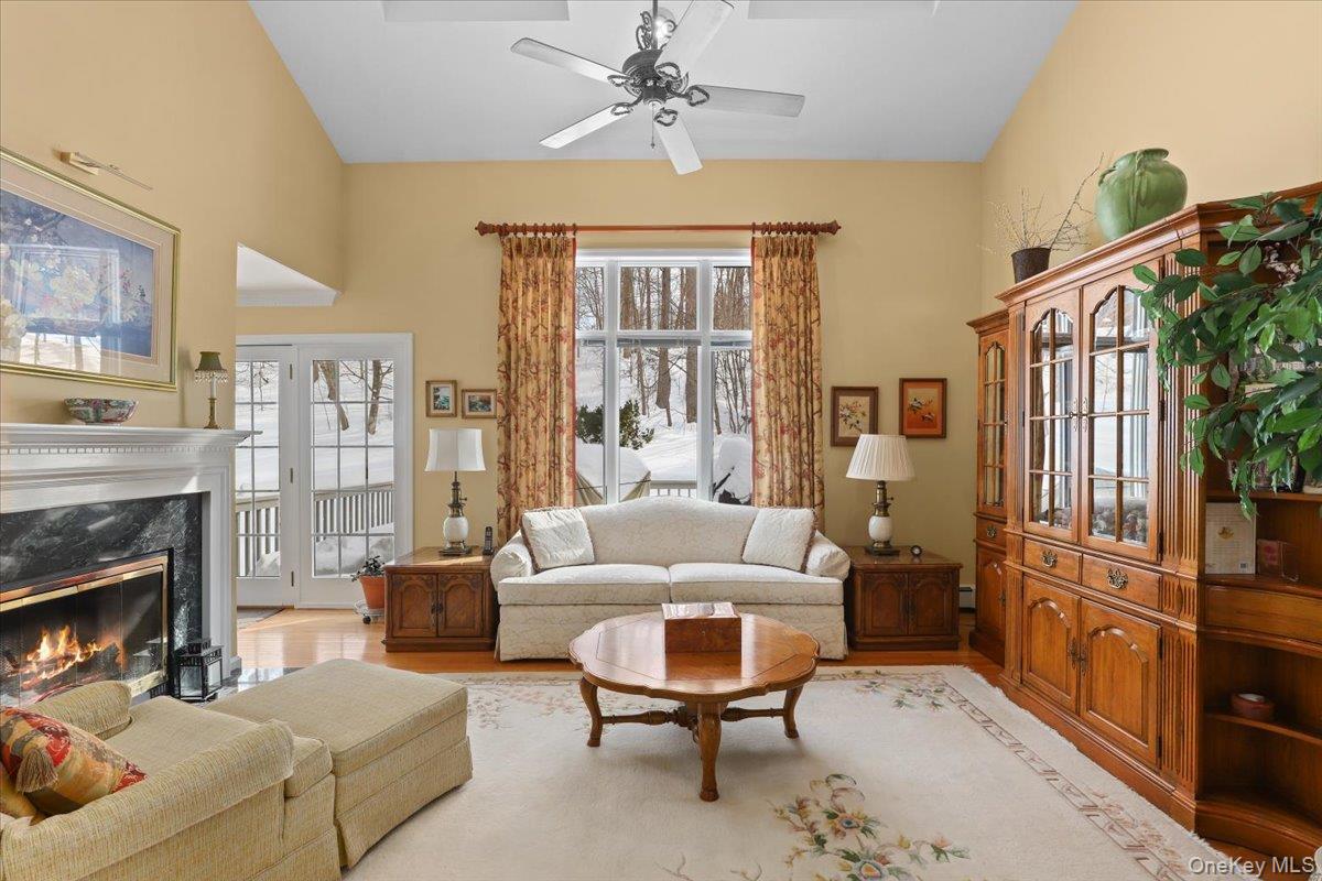 Beautiful three-bedroom, 3½-bath townhome in the sought-after Green Briar community. This sun-filled end unit offers a flexible, multi-level layout with a finished lower level ideal for a fourth guest room, home office, or recreation space. The main living areas are bright and welcoming, perfect for casual  life and social gatherings. Step out onto the rear deck and enjoy peaceful woodland views, creating a serene outdoor retreat. Additional features include an attached two-car garage and ample storage. Green Briar offers a maintenance-free lifestyle with resort-style amenities including pools, tennis, pickleball, clubhouse, and walking paths, all conveniently located near shopping, dining, major highways, and Metro-North.