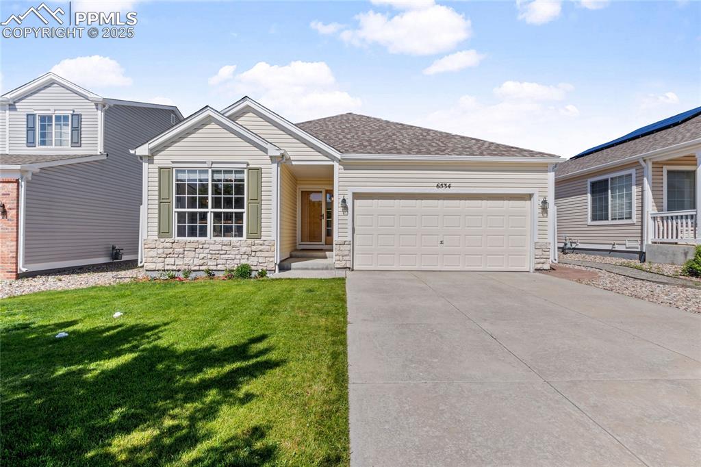 Welcome home to this beautifully updated ranch-style gem offering comfort, convenience, and a touch of charm throughout. This 3-bedroom, 2-bathroom single-family home is thoughtfully laid out with both everyday functionality and inviting living spaces. Step into the foyer, where you’ll find easy access to both the attached garage and the heart of the home—the kitchen. The kitchen features a cozy breakfast nook flooded with natural light, the perfect spot to enjoy your morning coffee. Just off the kitchen, the dining area flows seamlessly into the living room, making it ideal for entertaining or relaxing at the end of the day. The spacious primary suite is filled with natural light from a large window and features an ensuite bathroom and a generous walk-in closet. Two additional bedrooms are tucked away, offering privacy and comfort, along with a smartly placed laundry nook in the hallway for added convenience. Outside, you’ll discover a fully landscaped backyard that has been transformed into a true oasis—perfect for summer evenings, weekend gatherings, or simply unwinding in your own private retreat. With a practical layout, tasteful updates, and inviting indoor-outdoor living, this home offers the best of ranch-style living in a setting you’ll love coming home to!