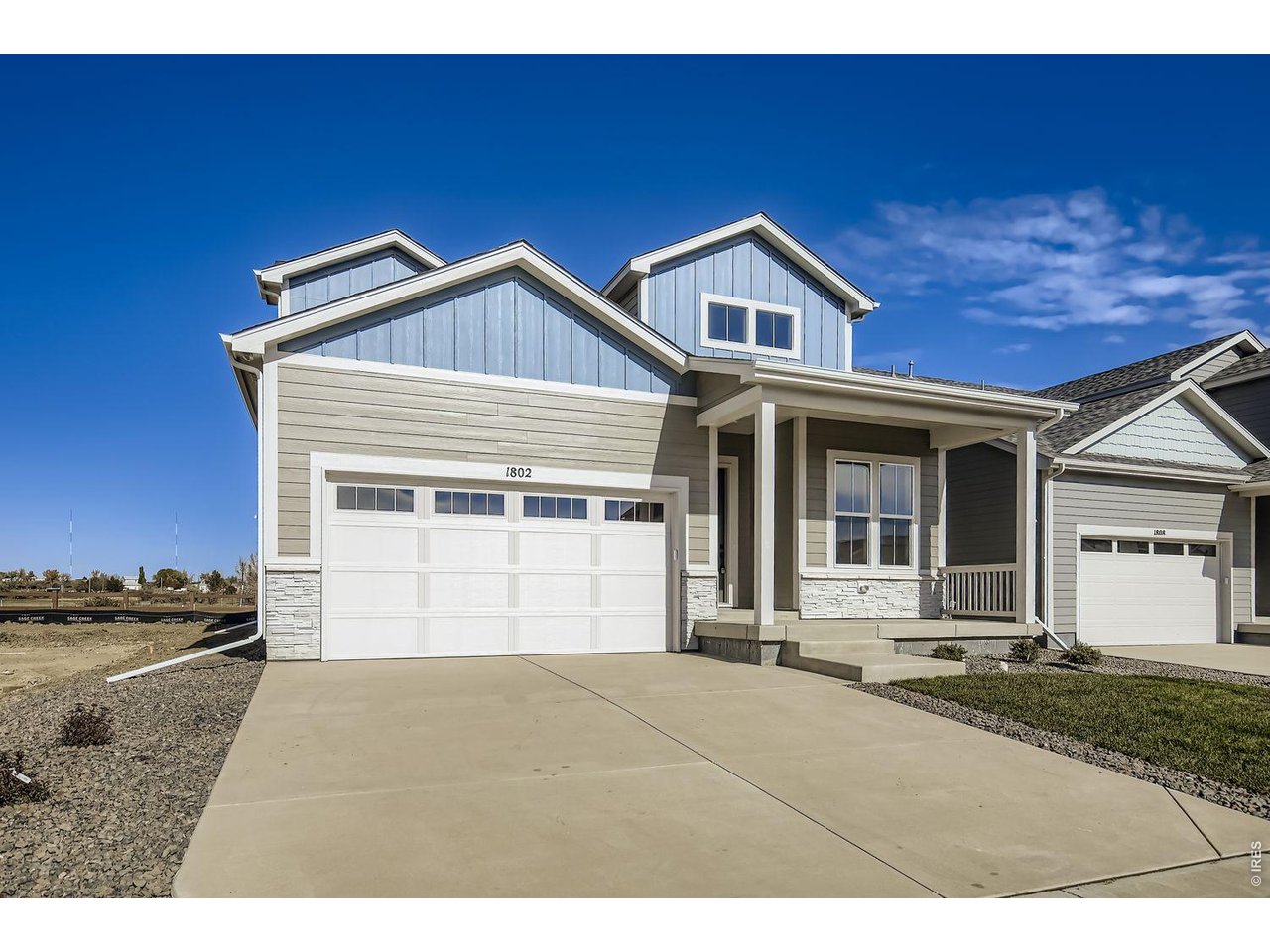 Move-in Ready, Priced below appraised value! Quietly set against private open space yet conveniently located, the Avocet is a charming two-story home featuring five bedrooms, four baths, and a study with French doors. Soaring ceilings and 8' interior doors add bold character and architectural distinction. The gourmet kitchen includes double ovens, a gas range with vented hood, an electric oven/microwave combination, dual pantries, and quartz countertops. The open-concept layout connects kitchen, dining, and living areas for seamless entertaining. Nearby is an organized drop zone and a convenient main level bedroom/bath. Upstairs, the owner's suite offers privacy and a full bathroom. A versatile loft, dedicated laundry, and secondary bedrooms complete the upper level. The finished lower level features nine-foot ceilings, an additional bedroom and bath, and ample space for recreation or media. Priced below retail, a rare new-build community with no metro district, low taxes, and HOA dues that include high-speed fiber internet, this home combines comfortable living with exceptional value. Prices, plans, and terms are subject to change without notice. Renderings and depictions are artistic concepts. Landscaping, hardscaping, and decorative elements shown may not be included in the purchase price.