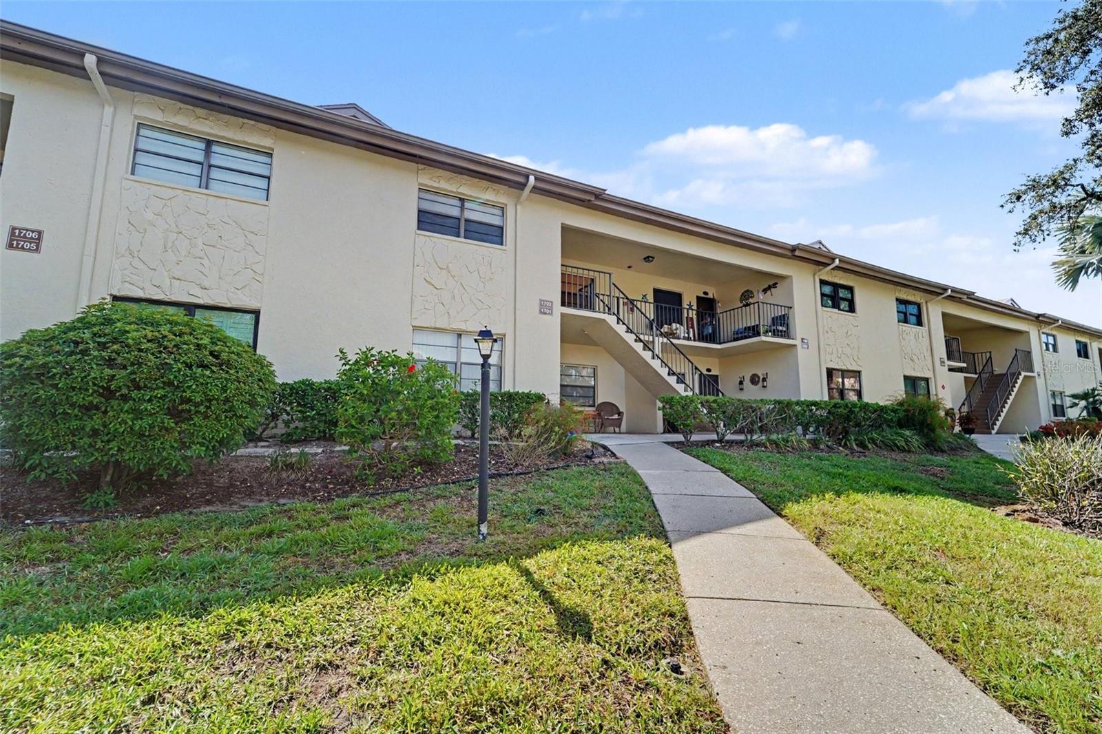 Welcome to affordable waterfront living with one of the best views in the community! This desirable top-floor condo overlooks a peaceful nature preserve and beautiful canal, where you can even watch dolphins swim by right from your own backyard view. With canal access leading toward the Gulf, you can enjoy the Florida waterfront lifestyle without the typical waterfront price tag. Even better, the property is NOT located in a flood zone and offers incredibly low monthly HOA fees, making this an exceptional value. HOA includes -roof, insurance, TV, Internet.Inside, you'll love the highly desired split-bedroom floor plan, soaring cathedral ceilings, and a screened-in lanai perfect for enjoying the water and preserve views year-round.This intimate community features only 68 units within charming two-story buildings, offering a more private and peaceful atmosphere. Community amenities include a fitness center, clubhouse, library, kayak rack, bike shed, and waterfront canal access—perfect for kayaking, biking, staying active, or simply relaxing by the water.Whether you're looking for a primary residence, seasonal Florida getaway, or investment opportunity, this condo offers the perfect combination of waterfront views, nature, amenities, affordability, and low-maintenance living.Top floor. Nature preserve views. Dolphins swimming by. Gulf access. Low HOA. No flood zone. Incredible value