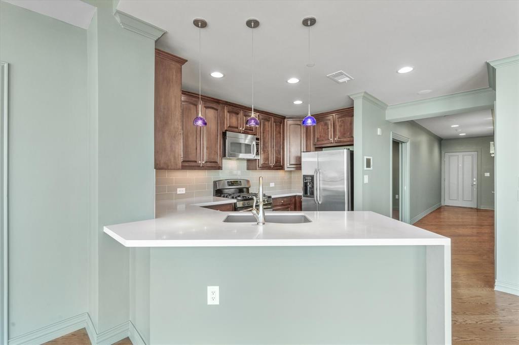 RARE LUXURY LEASE with breathtaking Downtown views! This 20th-floor stunner features RARE 3 PARKING SPOTS, Sundance views, hand-scraped hardwood floors and floor to ceiling windows. This 1,556 SF condo features 2 bedrooms, 2.5 bathroom with an open floor plan that allows for great entertainment. The kitchen is upgraded with dark cabinetry, waterfall counter tops, built-in wine fridge, GAS COOKING, and accent lighting. The office features a serene setting that can double as a living or guest area. The built-ins are perfect for work or guests. Truly a place to entertain! The kitchen is open to the living area. Sip your morning coffee on your patio overlooking Sundance Square. The Tower amenities include a 24-7 concierge, state-of-the-art fitness center, resort pool deck, fire pit area and community grill area. Parking#615,616,453

$100 application fee, $150 move-in- move-out fee, excellent credit