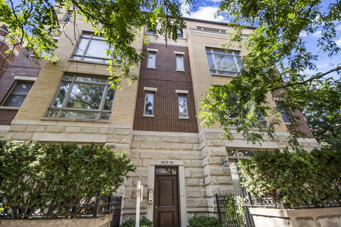 Spacious 2bed, 2bath corner condo in the heart of Lakeview, perfectly positioned between the Southport Corridor and Roscoe Village. This walk-up features an open floor plan, cozy gas fireplace, west-facing balcony, in-unit washer/dryer, and 1 garage parking space included. Steps to the Paulina Brown Line, Lincoln Ave restaurants, and everything Lakeview has to offer. Groceries, cafes, dining, and transit all at your doorstep. The best of city living in one of Chicago's most desirable neighborhoods.