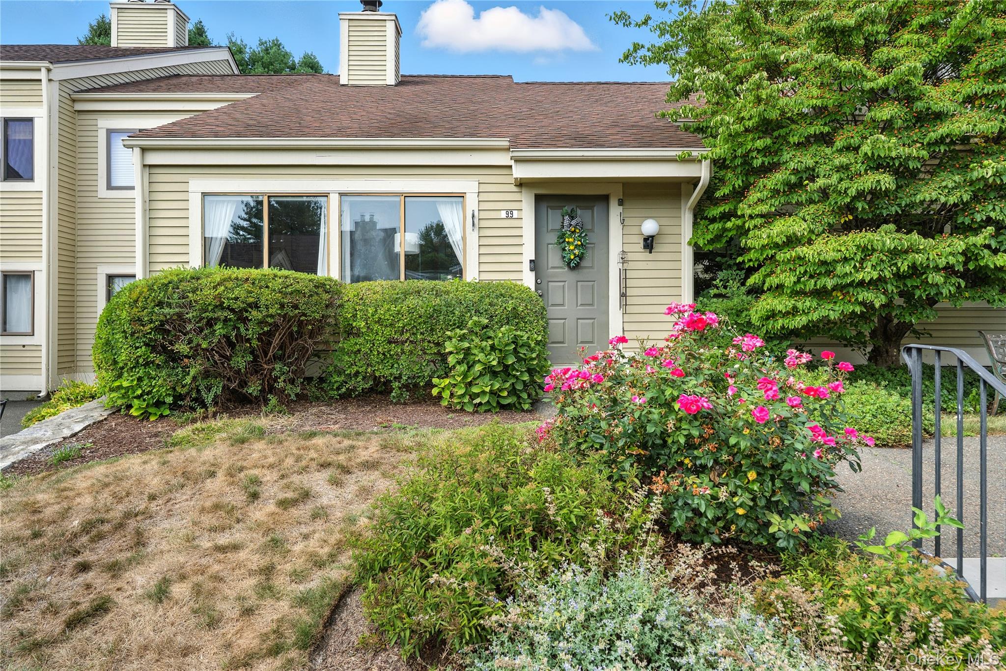 Welcome to 99 Fox Run Road — one of the few units in the complex that lives more like a private home, with no unit above. This 2-bedroom, 1-bath home combines the feel of a private retreat with modern upgrades, low taxes, and the coveted Katonah-Lewisboro School District (Meadow Pond Elementary).Upgrades include a brand new Bosch heating and ac system, new hot water heater and new washer/dryer. The unit comes with one garage located in front of the unit and one assigned parking space with an opportunity to lease a second. The main level hosts the living room with wood burning fireplace, dining area, kitchen with sliders out to the back patio, laundry, primary bedroom, full bathroom and second bedroom. Upstairs there is a loft area for additional living space and a spacious bonus room perfect for an office. Every detail has been thoughtfully updated for both style and function. Enjoy easy indoor-outdoor living with direct access to a private patio and expansive yard behind. Community amenities include two pools, tennis courts, basketball courts, and a children's playground. The Oakridge Commons shopping plaza is right around the corner for everyday convenience, and New Canaan Metro-North is just a 10 minute drive away. A rare opportunity to own a turn-key home in a great community. Don’t miss this one!