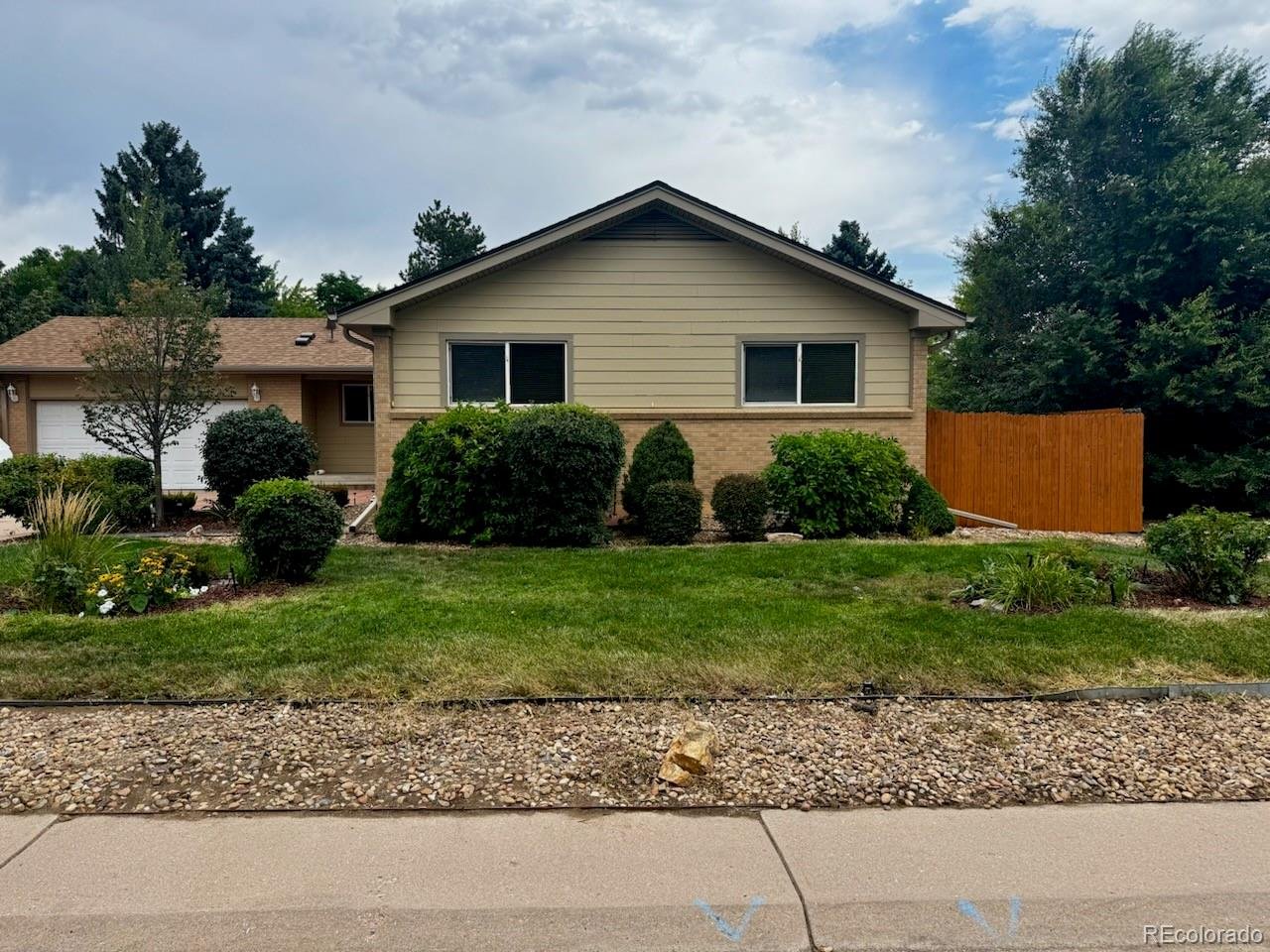 Beautifully Updated Southglenn Ranch with Flexible Living Options!Welcome to this updated, ranch in sought-after Southglenn! Excellent location within walking distance of Streets at SouthGlenn, with easy access to DTC, C-470, Santa Fe Corridor, Park Meadows, light rail and short drive to downtown Denver.This 5-bedroom, 3-bath home features an open-concept kitchen with granite countertops, stainless steel appliances, updated cabinets with upgraded pull-out drawers, pantry, island, under-cabinet lighting, pull-out trash cabinet, new stove and dishwasher. The primary bedroom offers a walk-in closet. Additional updates include a new roof, flooring, blinds, ceiling fan, hot water heater and A/C. Warm neutral finishes throughout.The finished basement provides flexible living space with a bedroom, three quarter bath, mini kitchen/bar, fridge, microwave, laundry hookup, storage and flex space for an office or hobby room.Accessibility features include large door openings, a built-in garage ramp for convenient access, and a roll-in shower with handheld wand. Ramp can be removed prior to closing if desired.Enjoy the outdoors with a covered patio, firepit area and additional parking for an RV or boat. The property also features a two-car garage, Hardy siding and no HOA.Conveniently located near Southglenn Country Club and Littleton Public Schools. A versatile home offering comfort, thoughtful updates and an exceptional location!