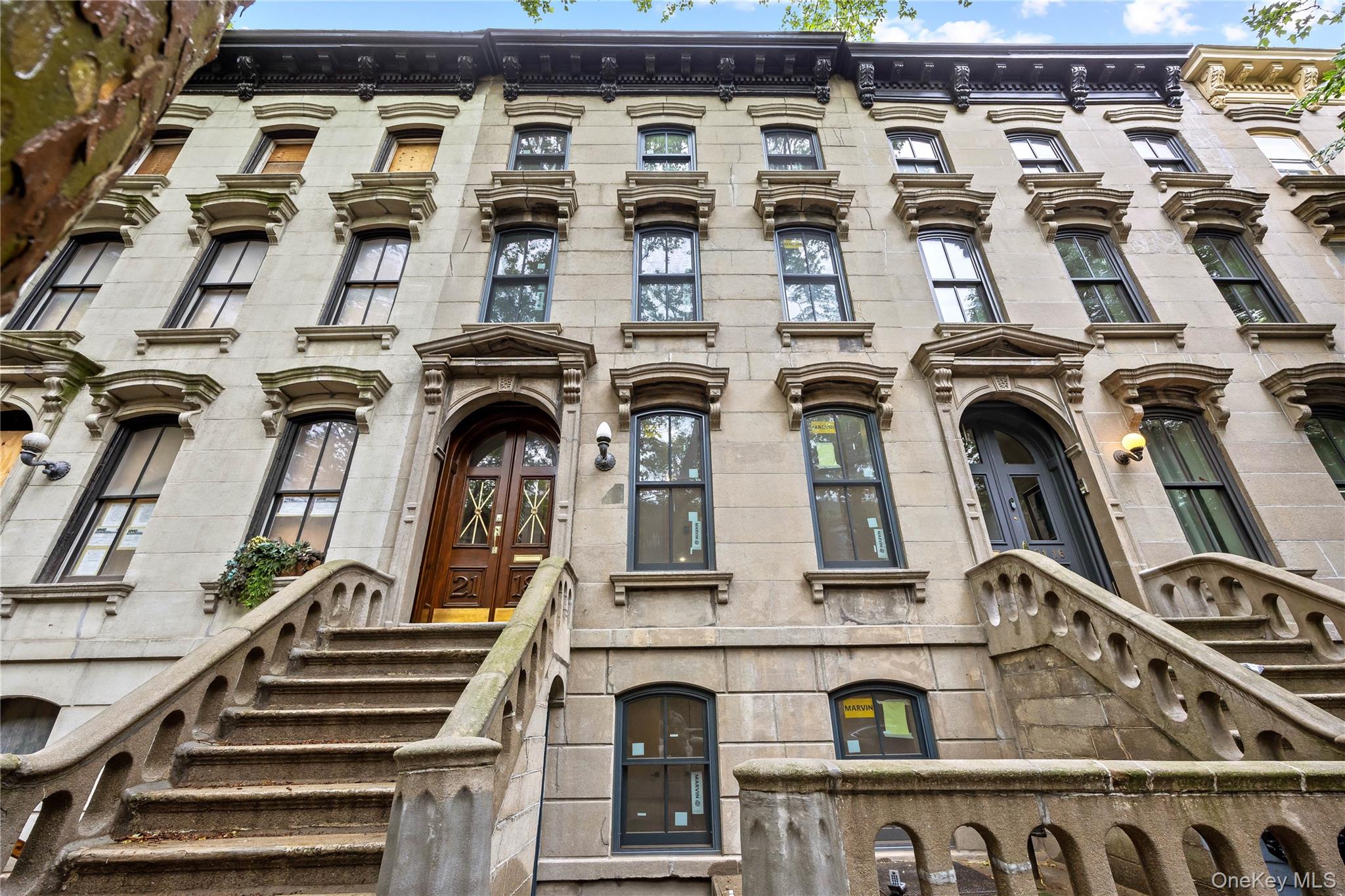Stunning Landmark Two-Family Townhouse – Fully Renovated in the Heart of Long Island CityA rare opportunity to own a beautifully restored, 20 feet wide landmarked two-family townhouse in one of LIC’s most desirable and historic blocks.Just minutes from Manhattan, this elegant residence blends classic charm with modern sophistication following a comprehensive, top-to-bottom renovation.Nestled on a picturesque tree-lined street, the home offers two beautifully designed units, each featuring airy layouts, soaring ceilings, and abundant natural light. Timeless architectural details—like original exposed brick and restored moldings—are paired with high-end contemporary finishes, creating a perfect harmony of past and present.Each residence includes:• Generously sized bedrooms and stylish full baths• Modern open kitchens with custom cabinetry, quartz countertops, and high-end stainless steel appliances• Washer/dryer units and ample closet/storage spaceThe garden-level unit offers direct access to a private backyard oasis, perfect for outdoor dining or entertaining. The upper unit features beautiful treetop views and refined interior design—ideal for owner-occupancy or rental income.Located in a quiet, residential enclave of LIC, just steps from Trader Joe's, Target , PS1 MoMA, Vernon Blvd dining, cafes, parks, and multiple subway lines (E, M, G, 7)—providing ultra-convenient access to Midtown Manhattan in under 10 minutes.Whether you're looking for a primary residence with rental income, or a long-term investment in a fast-growing neighborhood, this turnkey landmark home offers the best of Long Island City living.