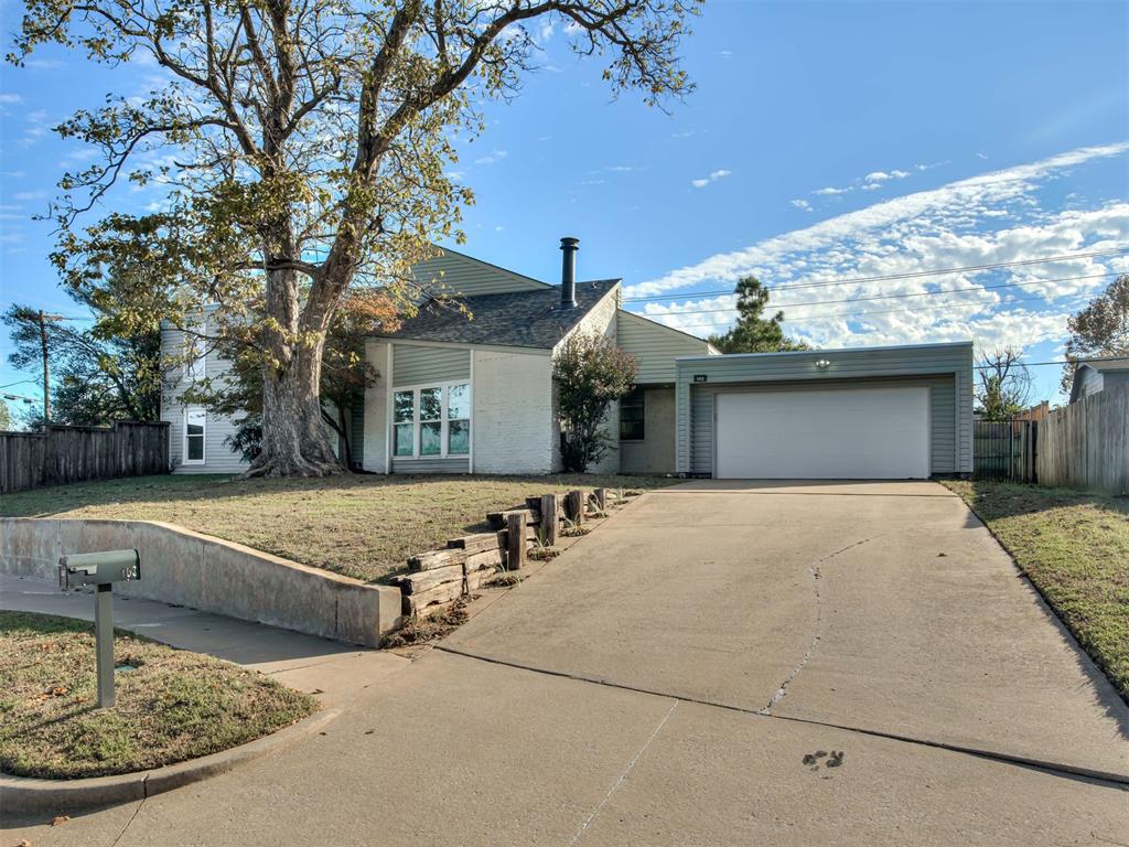 Bold character, contemporary style, and unexpected details make this West Norman home a true standout! Set on a distinctive corner lot, this 2,068-square-foot home offers 3 bedrooms, 2.5 baths, and a refreshing blend of modern updates and one-of-a-kind charm. From the soaring ceilings and beautiful bamboo flooring to the unique architectural touches throughout, this is a home that breaks away from the ordinary and invites you to imagine something different.Fresh interior paint along with updated lighting and plumbing fixtures create a bright, modern feel. The open living area features a fireplace and wet bar, making it the perfect setting for relaxing or entertaining. Built-in bookshelves and storage add charm and functionality throughout.The dedicated dining area flows into a galley-style kitchen, with convenient access to the laundry room and attached two-car garage. The kitchen features new appliances installed in 2024, while major updates provide added peace of mind, including Pella windows, an HVAC system, electric panel, and roof - all replaced within the last five years.The main-level primary suite offers a walk-in closet and private ensuite bath, showcasing stunning encaustic-style tile and abundant storage. A convenient half bath completes the main floor. Upstairs, two additional bedrooms share a full bath. The versatile loft-style bedroom offers endless possibilities as a home office, creative studio, library, or cozy reading retreat.Blending contemporary style, unique architectural character, and valuable recent updates, this West Norman home is anything but ordinary!