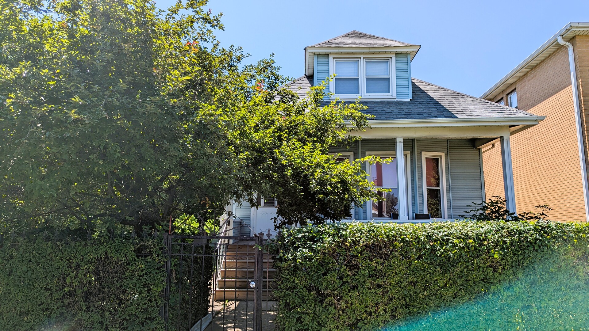Rare Opportunity - Oversized Double Lot with Income Potential!  This well-maintained legal 2-flat with a fully finished in-law suite in the basement is perfect for investors or large/multi-generational families seeking space, flexibility, and long-term value. With a total of 6 bedrooms and 3 full bathrooms, this property offers multiple living arrangements or rental opportunities under one roof.  Sitting on a massive double lot, both extra-deep and lined with mature trees, you'll enjoy an uncommon level of privacy and green space in the city-perfect for gatherings, gardening, or future expansion.     A 3-car garage plus an additional 1-car garage provides abundant parking and storage, enhancing both owner-occupant and tenant appeal. Whether you're looking to live in one unit and rent the others, house a large extended family, or generate strong rental income, this urban oasis is a smart, versatile investment.
