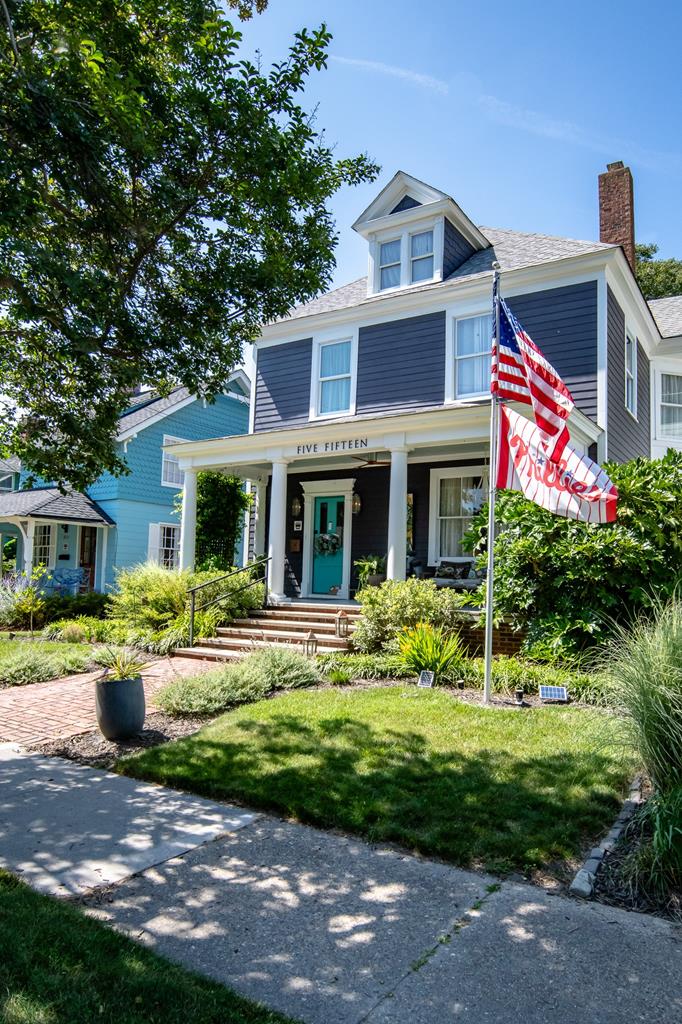 Historic Cassatt Cottage. Built in 1886 and respectfully updated with fretwork, pocket doors, 8" mouldings, original woodwork, high ceilings, dutch-door & wood floors beautifully maintained. Enter the foyer with an exquisite hand painted mural of the Eastern Shore. Staircase and wall woodwork complete the architectural appointments. Enter the living room with gas stove and through to the formal dining room. The renovated kitchen is complete with wet bar, pantry, a large work island, copper appointments & plenty of storage. Upstairs are 3 beds & 2 baths, all generous in size. Second floor laundry/sewing room. Off the kitchen is a large mud room and full bath leading to a side porch and backyard. The accessory building has lots of possibilities. Currently used as an office/workshop.