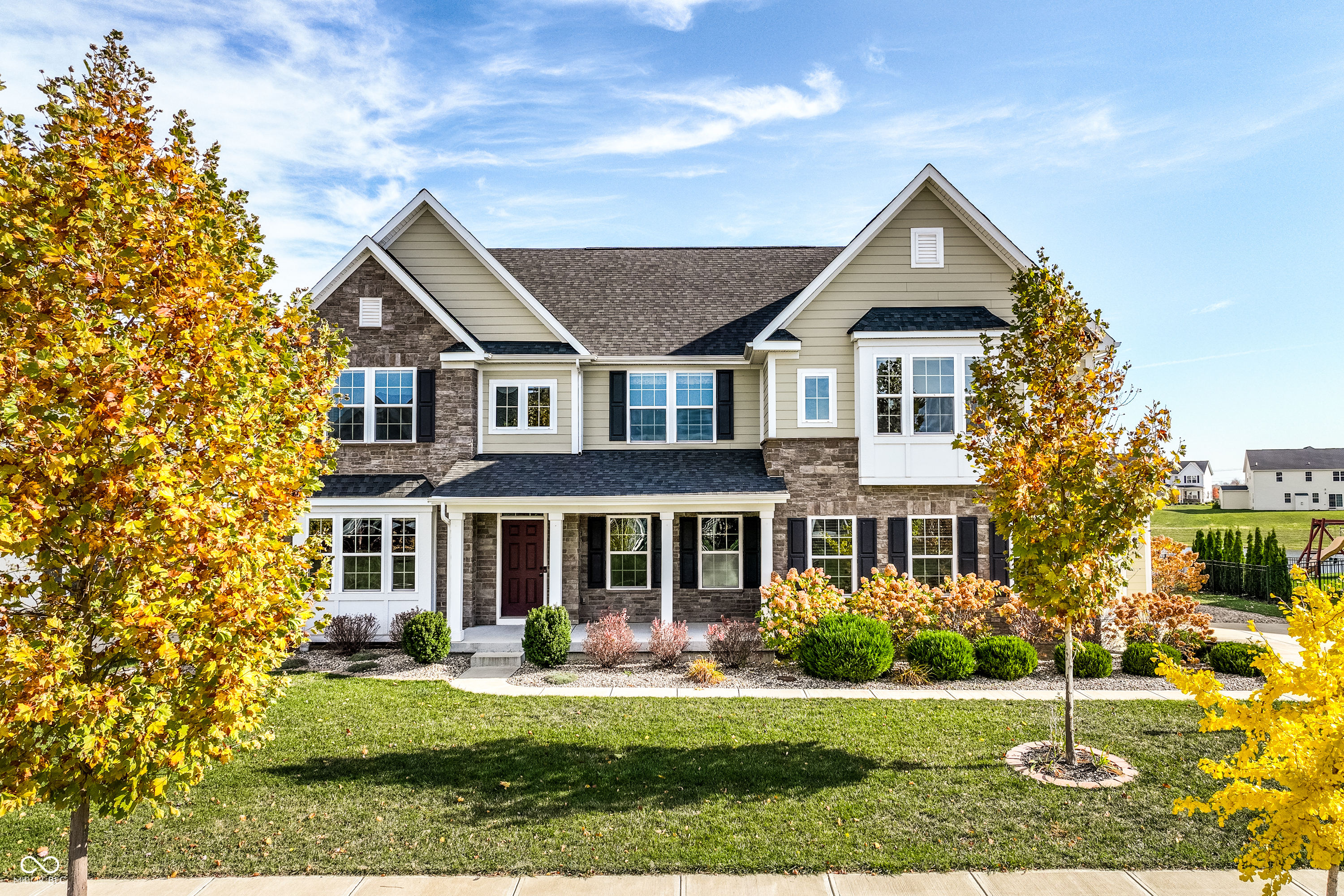 Built in 2020, this stunning 4-bedroom, 2.5-bath home perfectly blends modern comfort, thoughtful design, and a touch of luxury. Step inside and fall in love with the open floor plan featuring luxury vinyl plank flooring throughout the main level and a gourmet kitchen, complete with double ovens, a vented gas cooktop, stainless steel appliances, a huge center island, quartz countertops, and a custom tile backsplash. Upstairs, the spacious primary suite offers two large walk-in closets, a spa-like tiled shower, double sinks and an additional sitting room area. The convenient upstairs laundry room includes a utility sink and plenty of room for sorting and folding clothes! The home also features a full, unfinished basement, ready for your future finishing touches, and three garages for all your parking and storage needs. Step outside to your custom paver patio, where you can unwind and enjoy beautiful pond views, the perfect setting for morning coffee or evening sunsets. Located within walking distance of the neighborhood playground, you'll also enjoy access to top-notch community amenities including a swimming pool, park, and scenic walking trails. This home is proudly served by the award-winning Hamilton Southeastern (HSE) Schools. Beautifully designed, thoughtfully upgraded, and ideally located, this home has it all!