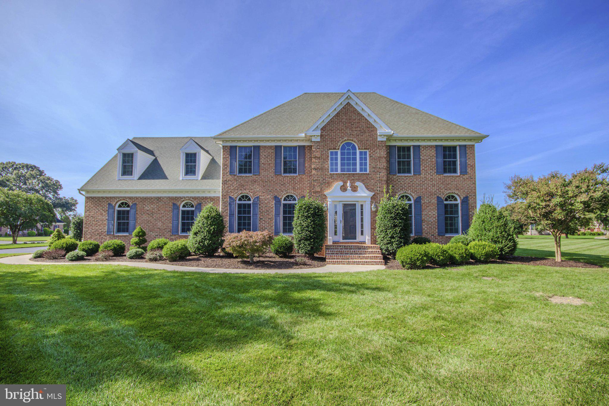 Set on one of the largest lots in Salisbury’s prestigious Steeplechase neighborhood, this stately brick-front home offers 3,006 square feet with four bedrooms, two and a half bathrooms, and an office space. The .96 acre property features an expansive lawn, mature trees, and beautifully maintained landscaping, creating an impressive setting from the moment you arrive.Inside, a two story foyer with an open staircase welcomes you into bright, spacious interiors accented by arched windows and classic moldings. The formal dining room provides an elegant space for entertaining, while the kitchen features warm wood cabinetry, a center island, double ovens, and a sunny dining area overlooking the backyard. The adjoining living room centers around a fireplace, offering a comfortable gathering space.The spacious primary suite includes a bathroom with dual vanities, a soaking tub, and a separate shower. Additional bedrooms offer flexibility for guests and hobbies. The generous unfinished walk-up attic space offers valuable storage with the potential for finishing.Outside, enjoy dining or relaxing on the rear patio with views across the expansive backyard. The attached three-car garage with oversized doors provides plenty of room for vehicles, equipment, and storage. Steeplechase residents enjoy a community pool, tennis courts, and playground, while nearby Pemberton Park offers outdoor recreation and community events, including the Wine Festival, the Good Beer Festival and seasonal Music & Arts events featuring live music, local artisans, and food trucks. With its substantial lot, versatile layout, and distinctive curb appeal, this home offers a rare opportunity in a sought after Salisbury community.