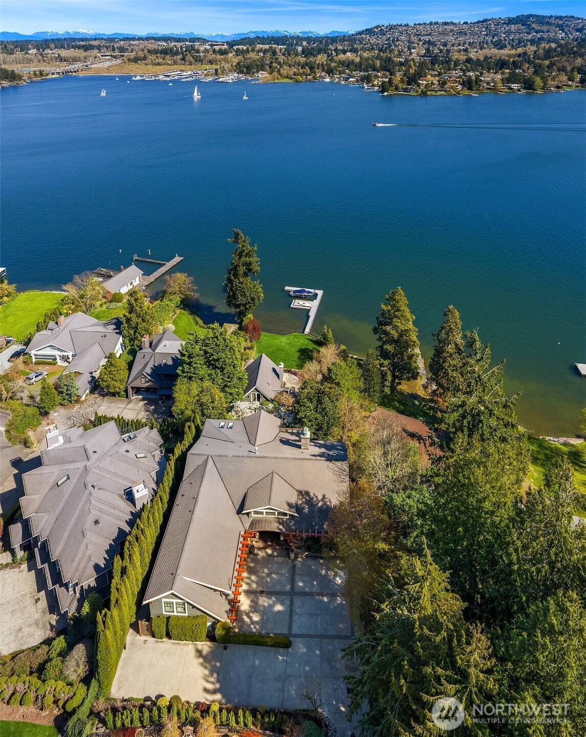 A 1/2 acre of sprawling grounds, ample parking areas and 90 front feet of sparkling waterterfront. Get on the water this summer and call this fabulous property home!!!!!
