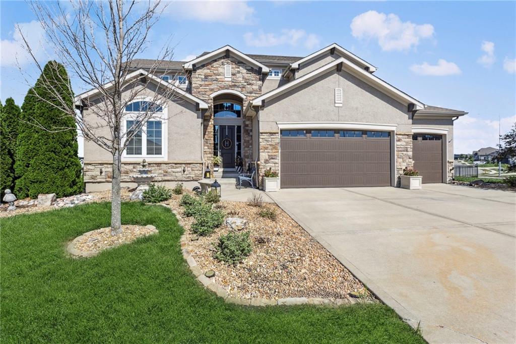 Lake views and elevated two-tier living on a spacious corner lot in sought-after Creekmoor! Enjoy championship golfing, and amenities that include lake access, clubhouse, tennis courts, and a fully equipped fitness center.This beautifully designed 5-bedroom, 4 full bath home offers a highly functional layout with the primary suite on the main level, along with a second main-floor bedroom perfect for guests or a private home office. The kitchen features granite countertops, a walk-in pantry, and plenty of space for gathering. Large laundry room on main level with plenty of storage room as well. Relax in the living room while taking in those gorgeous lake views.  Upstairs, you’ll find a large loft area, a convenient second laundry space, and three generously sized bedrooms—ideal for family living or entertaining.The bright, walk-out basement is filled with natural light and offers endless potential for future finishing. This home is a must see at this price point with gorgeous unobstructed lake views.A rare opportunity to enjoy space, views, and lifestyle all in one!  All measurements are to be verified by buying agent.