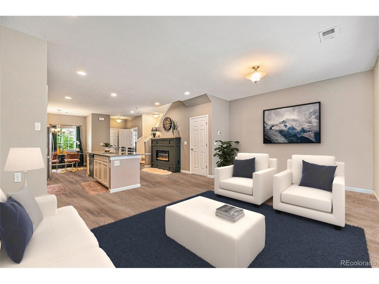 PERMANENT RATE DISCOUNT AVAILABLE - AT NO COST TO BUYER! Welcome to this beautifully updated home in thedesirable Aspen Hills community, offering the perfect blend of style, comfort, and convenience. The bright, open floor planis filled with natural light and features seamless flow between the living, dining, and kitchen areas. A custom built-inelectric fireplace serves as a stunning focal point, adding both warmth and modern character. The kitchen is a truehighlight-complete with granite countertops, stainless steel appliances, soft-close cabinetry, pantry, and a large centerisland ideal for meal prep, entertaining, or casual dining. The adjoining dining area and spacious great room provide plentyof space for gatherings or quiet evenings at home. Step outside to your private fenced patio, perfect for morning coffee,outdoor meals, or relaxing at the end of the day. Upstairs, you'll find two expansive primary suites, each with walk-inclosets and spa-inspired en-suite baths. This flexible layout is ideal for guests, multigenerational living, or creating a homeoffice or fitness space. Additional features include a detached 1-car garage with extra parking, brand-new premium carpetthroughout, and a prime location close to schools, trails, restaurants, and major highways. Don't miss your opportunity toown this exceptional home-schedule your private showing today!