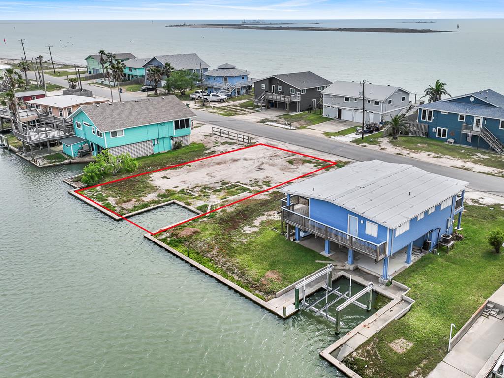 CANAL FRONT WITH BAYVIEWS! Drive by this large canal front lot that's just a stone's throw from Corpus Christi Bay! Enjoy afternoons puttering around the Bay and canals of Ingleside on the Bay. This community is unique and fun and is the perfect place to build your waterfront dream home. Just a short drive to Corpus and Portland