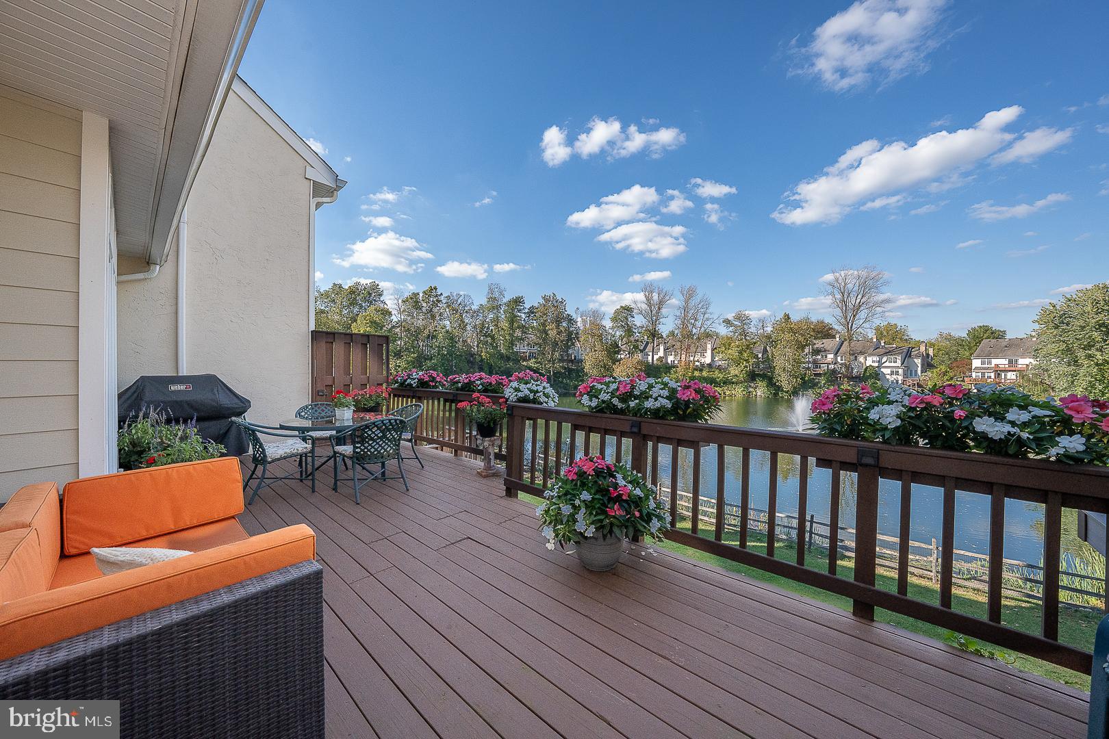 Exceptional Daylesford Lake Home with Stunning Lake ViewsThis remarkable home is widely regarded as one of the finest in the Daylesford Lake community. It boasts one of the most tranquil and scenic views of the lake, offering a unique and peaceful setting. The property has been meticulously maintained and thoughtfully updated by its original owners, ensuring that every improvement enhances its appeal and functionality.The first floor of the home is designed with high ceilings and an inviting open floor plan. The cozy living room and elegant dining area seamlessly connect to the family room and kitchen, which serve as the focal point of this level. The family room features a three-sided marble gas fireplace and opens to an impressive custom-built kitchen highlighted by a stunning eating island. French doors in this area lead out to a spacious deck, ideal space for relaxation and entertaining. Throughout every season, the family room, kitchen, deck, lower-level great room and its adjoining porch, as well as the primary bedroom’s sitting area, provide breathtaking lake views. Additional features on the main level include a convenient powder room and a laundry room with direct access to the attached oversized one-car garage. Rich hardwood floors throughout this level add warmth and elegance to the living spaces.Upstairs, the primary bedroom suite offers a luxurious retreat with a sitting area, a sleeping area, and a spacious bathroom. The bathroom features a stall shower, soaking whirlpool tub, dual sinks, mirrored skylights, and abundant closet space. Two additional bedrooms and a hall bath complete this floor. All bedrooms have wood flooring, and every closet, including the primary room walk-in closet, is equipped with built-in wooden shelving and hanging organizers systems.The third floor includes two connected spaces with flexible uses, such as a TV area and home office or, as currently arranged, additional bedrooms for visiting children. Both rooms are equipped with operable venting skylights that are mirrored to enhance the sky view and to reflect the light. This floor is served by a separate AC system.The lower level is a surprising highlight of the home, featuring soaring 12-foot-high ceilings +/-. A large wet bar area complements the expansive great room, which has two sets of French doors opening to a beautiful stone patio for perfect outdoor enjoyment. This level also presents a bedroom (currently used as an office), a generous bathroom, and a storage space with built floor-to-ceiling wooden shelving. This is an ideal place to be used as a private guest suite, a quiet retreat or an amazing “great room”.The list of updates is extensive, from the custom-designed remodeled kitchen, the updated/redone bathrooms, the hardwood floors throughout the first and second floors, the custom-designed closets, the mirrored skylights, the upgraded stair steps, …… to the freshly painted interior.This exceptional unit is truly a gem, ready to be appreciated and enjoyed by its next owner for the extensive improvements and features it offers and especially for the remarkable views. While interiors can be updated on any property, the fantastic location of this home can rarely be matched.