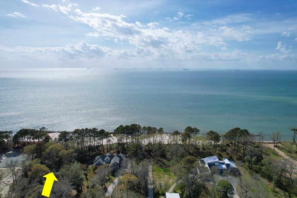 Gorgeous Beachfront Lot located in upscale beachfront area offering a mile and a half of one of the most pristine beaches on the Shore. Enjoy 180 degree views of clean, clear blue water. Mid-afternoon brings silver, shimmering water views topped off at twilight by some of nature's most dazzling sunsets. Towering pines and hardwoods teeming with abundant birdlife on this large 2.5+ acre beachfront lot. Excellent builders available to help you design and build your dream home. This lot is located in a small beachfront neighborhood with very low density and lots of open space. Pool and tennis membership available. Just 10 minutes to historic town of Cape Charles and about 30 minutes to Virginia Beach. This property is protected by substantial shoreline rip rap.