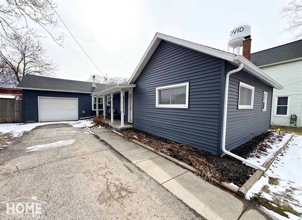 This move-in ready ranch style home is located at 123 W Williams St in Ovid!  This 3 bedroom 1 bath home features wooden floors complemented by new carpet. The primary bedrooms stand out with stunning cathedral ceilings . Enjoy a formal dining room and a spacious kitchen space with new appliances. Updated bathroom, a wood stove to keep cozy and new vinyl siding! The attached one-car attached garage adds comfort, convenience and extra storage!