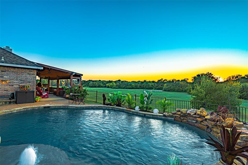 Welcome to this beautifully updated 3-bedroom, 2-bath home, offering a true backyard oasis and countless upgrades throughout. The exterior boasts fresh paint on the house trim, garage doors, and awnings, along with an upgraded front door that enhances curb appeal. The spacious patio features a fresh non slip coating, new stain, and a storage shed with new flooring. Enjoy outdoor living with a stunning pool equipped with lighting, surround sound, new filters, and a recently replaced pool cell, all currently maintained professionally. Seller will convey TV and portable outdoor AC unit for the patio to be entertainment-ready. Additional updates include a cedar-framed patio with windows made of UV acrylic and an extended Techwood Ultrashield composite deck which creates the perfect blend of comfort and style. This home sits on a premium lot backing to a peaceful greenbelt.

The home was fully remodeled in 2019 and the interior showcases custom cabinetry, a fridge inset that conveys, large exposed wood beams, a sliding barn door pantry, and a custom kitchen light fixture. Both bathrooms have been tastefully updated. The garage has been transformed into a versatile game room with custom cabinets, finished walls and ceiling, and a mini-split unit for heating and cooling. Don't need the game room or extra space, it can easily be converted back. It also includes attic access with flooring, shelving, and lighting. Best of all, the pool table, fridge, TV, and surround sound system are all included in the sale! To top it off, a brand-new HVAC system was installed in July 2025, upgraded from 3.5 tons to an efficient 4-ton system, with both interior and exterior units replaced. This home truly has it all—style, comfort, and turnkey upgrades.