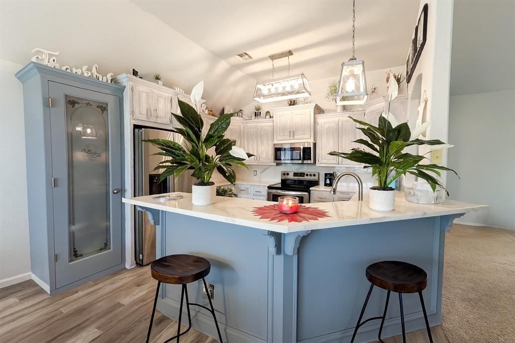 OPEN HOUSE THIS SUNDAY 11/12 from 1-4pm!Come see this charming and well-loved home in the highly sought-after Moore School District! Perfectly located near interstates, shopping, and local amenities, this home offers both comfort and convenience.The spacious layout features high ceilings, updated lighting, and a cozy gas fireplace that invites you to relax and unwind. The split floor plan provides privacy and functionality, with the primary suite and ensuite bathroom on one side of the home, and two additional bedrooms and a full bath on the other.The beautifully remodeled kitchen offers modern finishes such as a stainless steel basin sink, quartz countertops, updated lighting, a full pantry, and a bar with extra seating — ready for casual dining or entertaining guests.Charming details like custom paint, barn doors, and thoughtful touches throughout create a warm, inviting atmosphere that feels like home the moment you walk in.Enjoy the extras that make life easier and more enjoyable — permanent exterior holiday LED lights, ample attic storage, a Level 2 EV charger that stays with the home, PLUS - the seller is offering an allowance for updates or closing costs with a full-price offer. This lovely home is turn-key, ready for you to move in and relax!