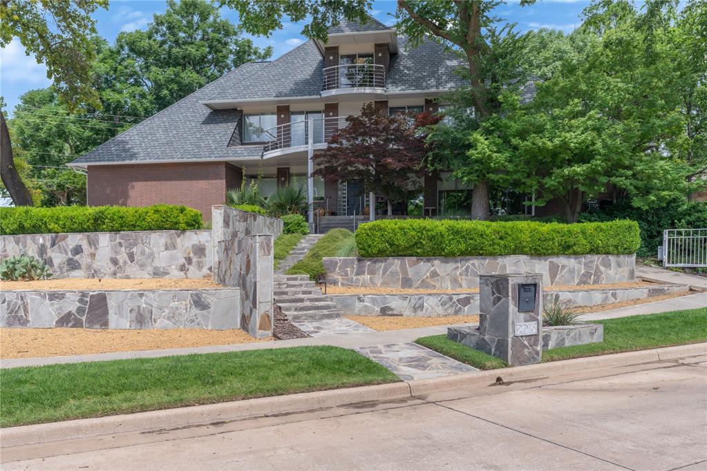 Tucked away behind private gates in Norman, this exceptional four-bedroom, four-bathroom estate offers a rare blend of seclusion and accessibility just moments from I-35 and the University of Oklahoma. The residence strikes a perfect balance between timeless architecture and contemporary sophistication. The interior is designed for both high-end wellness and entertainment, featuring a dedicated private gym, a spacious game room, and a third-story balcony that captures sweeping views. Outside, the property transforms into a personal resort with a fully fenced perimeter, a stucco fireplace for cool evenings, an included hot tub, and the added convenience of an oversized three-car garage and dedicated RV parking. Every inch of this home reflects thoughtful craftsmanship and refined living, providing a quiet sanctuary without sacrificing proximity to the heart of the city.