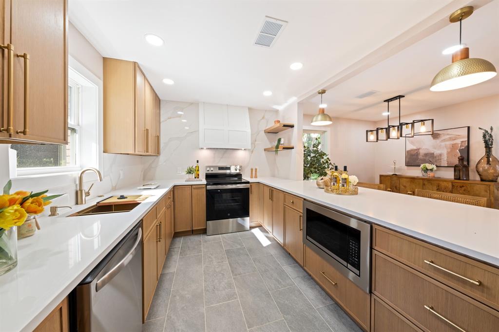 Welcome to 10528 Swallow Ln — a thoughtfully renovated home located in the highly sought-after Lochwood neighborhood of White Rock Lake, one of the most desirable and fastest-rising areas in Dallas. This move-in ready home blends comfort, style, and modern upgrades throughout. At the heart of the home is a truly stunning kitchen featuring a full-height quartz backsplash, solid white oak cabinetry, a custom designer range hood, and a spacious layout ideal for entertaining and everyday living. The home has been updated top to bottom, offering fresh finishes and premium details in every room  from the designer bathrooms to the elegant living and dining spaces. Large windows fill the home with natural light, and the layout flows seamlessly into a spacious backyard, perfect for relaxing or entertaining.All of this in a quiet, tree-lined neighborhood just minutes from White Rock Lake, the Dallas Arboretum, and Casa Linda Plaza, with quick access to shopping, dining, parks, and major highways.