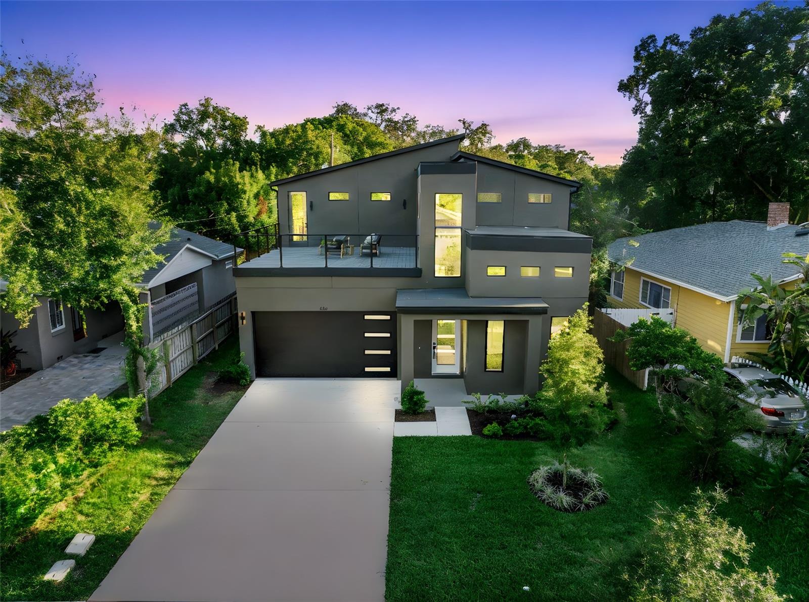 Under contract-accepting backup offers. Welcome to this exquisite 4-bedroom, 3-bathroom luxury residence offering 3,067 sq ft of meticulously designed living space in one of Orlando’s most sought-after neighborhoods. Ideally located just steps from vibrant downtown College Park, top-rated Princeton Elementary, and a short drive to downtown Orlando and the theme parks, this home seamlessly blends sophisticated design with everyday functionality. From the moment you step inside, you're greeted with premium finishes including upgraded tile selections, designer light fixtures, and top-of-the-line appliances. The gourmet kitchen features upgraded cabinetry paired with a rare, eye-catching countertop selection that is both stylish and unique—perfect for the culinary enthusiast. The formal dining room, enclosed with charming barn doors, adds a touch of character and flexibility to the open floor plan. Throughout the home, real wood accents create warmth and authenticity, from the beautifully stained staircase to the tongue-and-groove exterior ceilings. Retreat to the spacious master suite, which opens to a private balcony overlooking the brand new pool. The spa-inspired master bath boasts a luxurious wet room complete with an oversized shower and freestanding tub—your personal oasis. Step outside to enjoy two expansive second-story balconies, both finished with high-end Trex decking. One is perfect for entertaining, with ample space for an outdoor kitchen, sun deck, or rooftop garden, while the other offers serene views of the pool area directly from the master suite. The newly built pool features a mini pebble tec sun deck, LED lighting, and a state-of-the-art variable speed pump—designed for efficiency, relaxation, and year-round enjoyment. The epoxy-coated garage floor adds both durability and style. This is a rare opportunity to own a thoughtfully upgraded, move-in ready home just moments from the best Orlando has to offer.