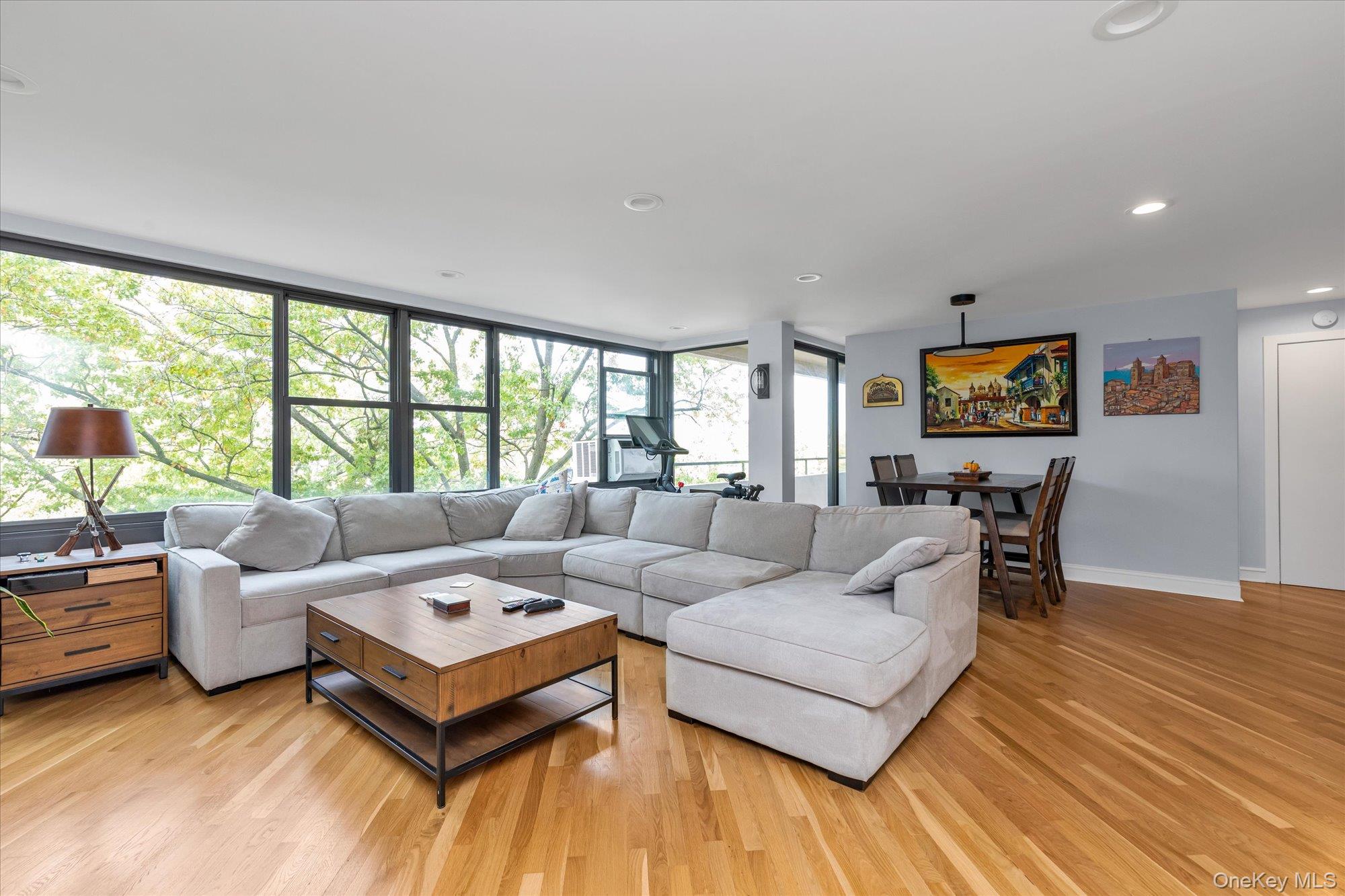 Welcome to Le Harve on the Water in Whitestone! This immaculate one-bedroom co-op features an updated kitchen with new appliances and a Viking stovetop, beautiful hardwood oak floors, and upgraded electrical throughout. The spa-like bathroom offers both a Jacuzzi tub and a separate enclosed shower. Dual balcony access from the living room and bedroom showcases peaceful, tree-lined sunset views. Enjoy resort-style amenities, including a waterfront clubhouse with a cafe, fitness center, two outdoor pools, tennis courts, and playgrounds, as well as scenic parks and waterfront paths located several blocks away.