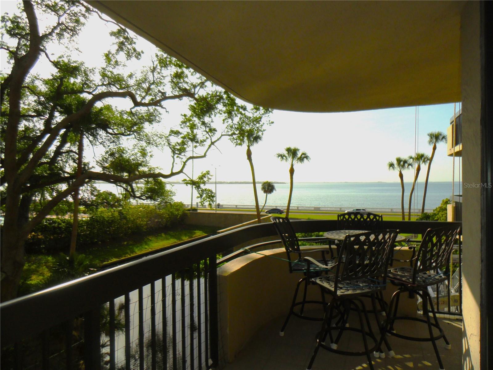 Welcome to The Atrium in South Tampa, perfectly positioned along Bayshore Boulevard withstunning water views and miles of scenic waterfront sidewalks ideal for running, walking, orbiking. Enjoy a short stroll to South Howard Avenue (SOHO) or Hyde Park Village, whereyou’ll find vibrant nightlife, top-rated restaurants, cozy coffee shops, and a movie theater. Withinthe complex, take advantage of resort-style amenities including a pool, work out facility orunwind on your private covered balcony overlooking the bay. This updated 2-bedroom, 2-bath split floor plan is located on the second floor, offering convenient elevator access or easy stair entry. The open-concept living room, dining area, and kitchen flow seamlessly together, all with direct access to the balcony through newer hurricane-rated sliding doors—perfect for enjoying the water views. The spacious primary suite features its own private balcony, a large walk-in closet, and a fully updated bathroom. The second bedroom is ideal for guests or can easily serve as a generous home office or den. Additional highlights include wood-look tile flooring, an interior laundry room with washer and dryer, two assigned garage parking spaces, and a recently paid seller assessment. This exceptional waterfront unit truly has it all—schedule your private showing today.