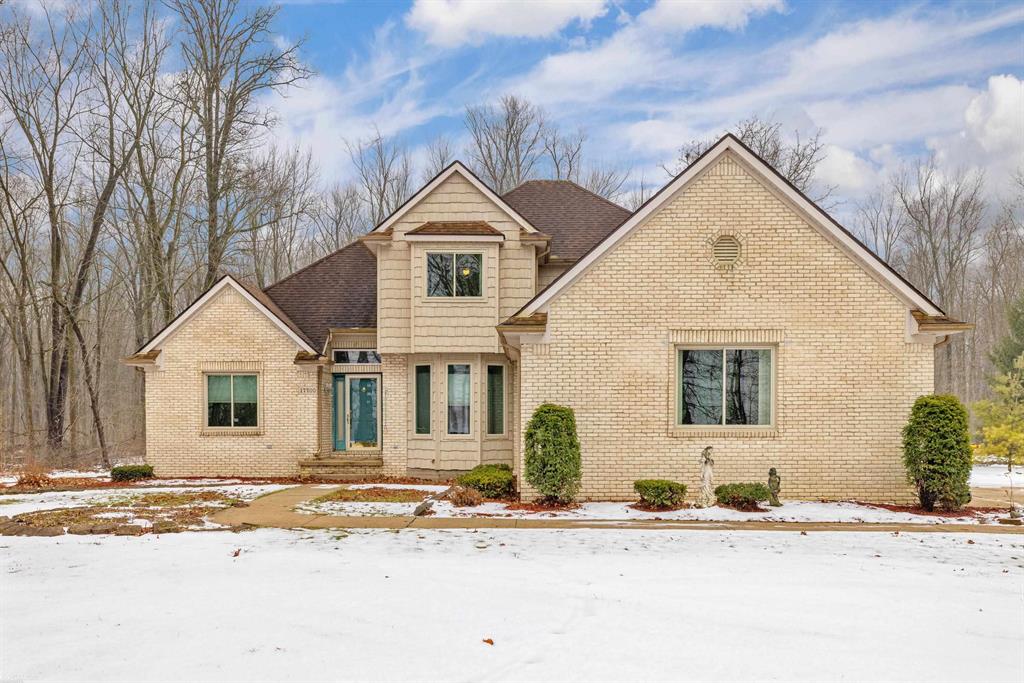 Beautiful 3 bedroom split level in rural Armada! Located on 10 tranquil acres, you'll fall in love with the amount of space and the feel of home the moment you walk in. The floor plan lets in an abundance of natural light that give it an open airy feeling. A large updated kitchen that has a ton of cabinets and prep space, features granite counters, a large island, stainless steel appliances, and hardwood floors. Generous sized great room has a natural fireplace and vaulted ceilings. First floor primary en-suite bedroom is huge and has a spa-like feel with a connected private bath that includes a giant walk-in shower. The walk in closet and additional his a hers closets complete this luxury retreat. Both secondary bedrooms and full bath are located on the second floor giving everyone plenty of space and privacy. First floor office/den offers the flex space today's buyers need. A full finished basement is perfect for all your indoor entertaining, man cave or home theater.   The property has a 19ft deep pond and 24 x 38 pole barn with power and cement floor. Other features include New furnace and AC in 2025, whole house generator, newer roof, Mary Grove awning, and back up sump. Nothing to do here but unpack, sit back, and enjoy watching the wild life on 10 acres of private serenity, welcome home!