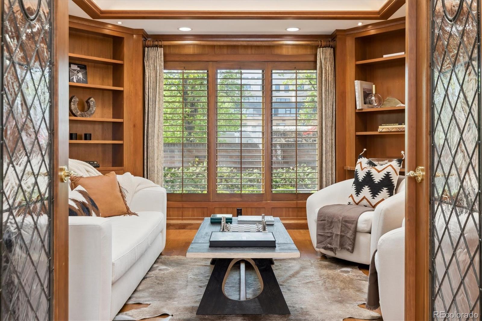 Luxury Furnished Home in the Heart of Cherry Creek! Discover unparalleled elegance in this expansive, fully furnished Cherry Creek masterpiece, perfectly situated just steps from the area’s premier restaurants, boutiques, and shopping. This stunning residence offers a seamless blend of sophistication and comfort, ideal for those seeking a prime location with every modern amenity. This expansive residence boasts a spacious and modern layout with high-end finishes, featuring a gorgeous main level with a large courtyard for outdoor enjoyment, a stylish bar perfect for hosting, and open-concept living areas bathed in natural light. The upper level offers an expansive primary suite with a luxurious en-suite bathroom and ample closet space, alongside a well-appointed guest room, while two beautifully designed basement bedrooms provide privacy and comfort for family or guests. Entertainment and wellness are elevated with a dedicated theater room for cinematic experiences and an expansive fitness room for daily workouts, complemented by a rare 3-car attached garage for ultimate convenience in the heart of Cherry Creek. This exceptional home is a rare find, combining expansive living spaces, high-end furnishings, and an unbeatable location. Perfect for those who desire luxury and convenience in one of Denver’s most coveted neighborhoods.