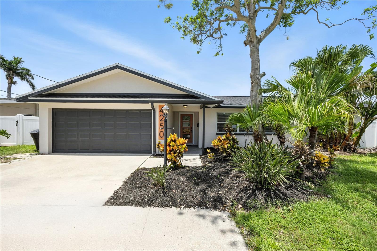 Welcome to your beautifully updated waterfront home in the highly desirable Patrician Point neighborhood of St. Petersburg! This move-in ready property features a brand-new roof, stylish updates throughout, and direct canal access—perfect for boaters.

Inside, you'll find a bright, open layout with modern finishes, a sleek kitchen with stainless steel appliances, and two built-in wine fridges. The spacious living and dining areas lead to a large covered back porch with serene canal views—ideal for entertaining or relaxing.

The generously sized backyard offers plenty of room for outdoor living or a future pool. Although the home did experience flooding during recent hurricanes, it has been professionally remediated, permitted, and fully remodeled.

Enjoy the best of Florida waterfront living in one of St. Pete’s most sought-after communities. Schedule your private showing today!