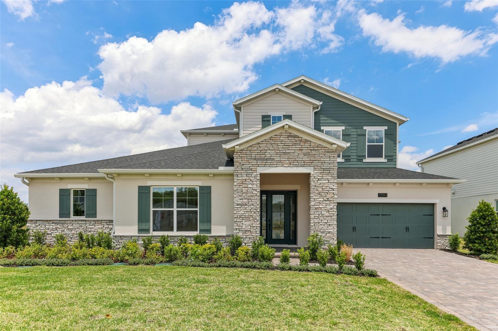 Under Construction. Located at 17013 Overstory Road in Orlando, this new construction home offers 5 bedrooms, 4.5 bathrooms, a formal dining space, a 34' x 10' lanai, a 20'5" x 17'8" loft–offering additional space for entertaining–a 3-car garage, and much more! This newly constructed home combines functionality with elegance, featuring clean lines and quality craftsmanship at every turn. The thoughtful floorplan maximizes living space while providing privacy when needed. Your first-floor owner's bedroom offers convenience and accessibility, while additional bedrooms provide comfortable accommodations for family members or guests. The heart of this home is its welcoming open-concept design that seamlessly connects kitchen, dining, and living areas—creating the perfect environment for both everyday living and special occasions. High ceilings and abundant natural light enhance the sense of spaciousness throughout. Every aspect of the home has been designed with both comfort and style in mind, making it an excellent choice for discerning buyers seeking a new construction home in Orlando!