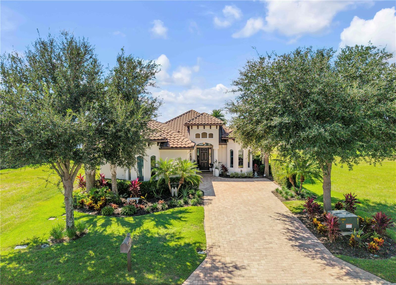 Tucked within the exclusive gated golf course community of The Conservatory at Hammock Beach, this exquisitely appointed single-story home offers the perfect blend of luxury, comfort, and serene coastal Florida living.  Built in 2017 and meticulously landscaped and maintained, this home offers unparalleled views of the Conservatory Golf Course's 17th fairway and green. The split plan includes 3 Bedrooms, 2.5 Baths, and a Study/Bonus room and  and 18 Ft ceilings throughout. The Chef's kitchen boasts stainless steel KitchenAid appliances,  under- and over-cabinet lighting , gas stove, oversized sink, quartz countertops and 42" cabinets while the Dining Area, strategically located off the kitchen, enhances the flow of the home.  The living room features a gas fireplace accented with stacked stone, surrounded by built-ins. A large study or bonus room with French Doors and a Bay Window adds a touch of elegance.  The Master Suite is a haven with light-filled windows; the en-suite bath includes dual vanities, a walk-in shower, and his-and-her walk-in closets.   Triple sliders open to an inviting outdoor living area, perfect for entertaining.  Step through the sliding glass doors onto the screened lanai, which is perfect for entertaining.  Enjoy morning coffee or evening sunsets overlooking the golf course and your heated pool with decorative fountains. This is more than a home; it's a stunning masterpiece in an amazing community.   Located within one of Palm Coast’s most sought-after communities, residents enjoy the privacy and security of the manned guard-gated environment surrounded by the Tom Watson-designed Conservatory golf course, with optional membership opportunities to Hammock Beach Club amenities including oceanfront beach access, pools, dining, and more. A perfect opportunity to own a move-in-ready home in a premier golf community. You must see it to truly appreciate the craftsmanship and lifestyle it offer —the pinnacle of Florida living at its finest.