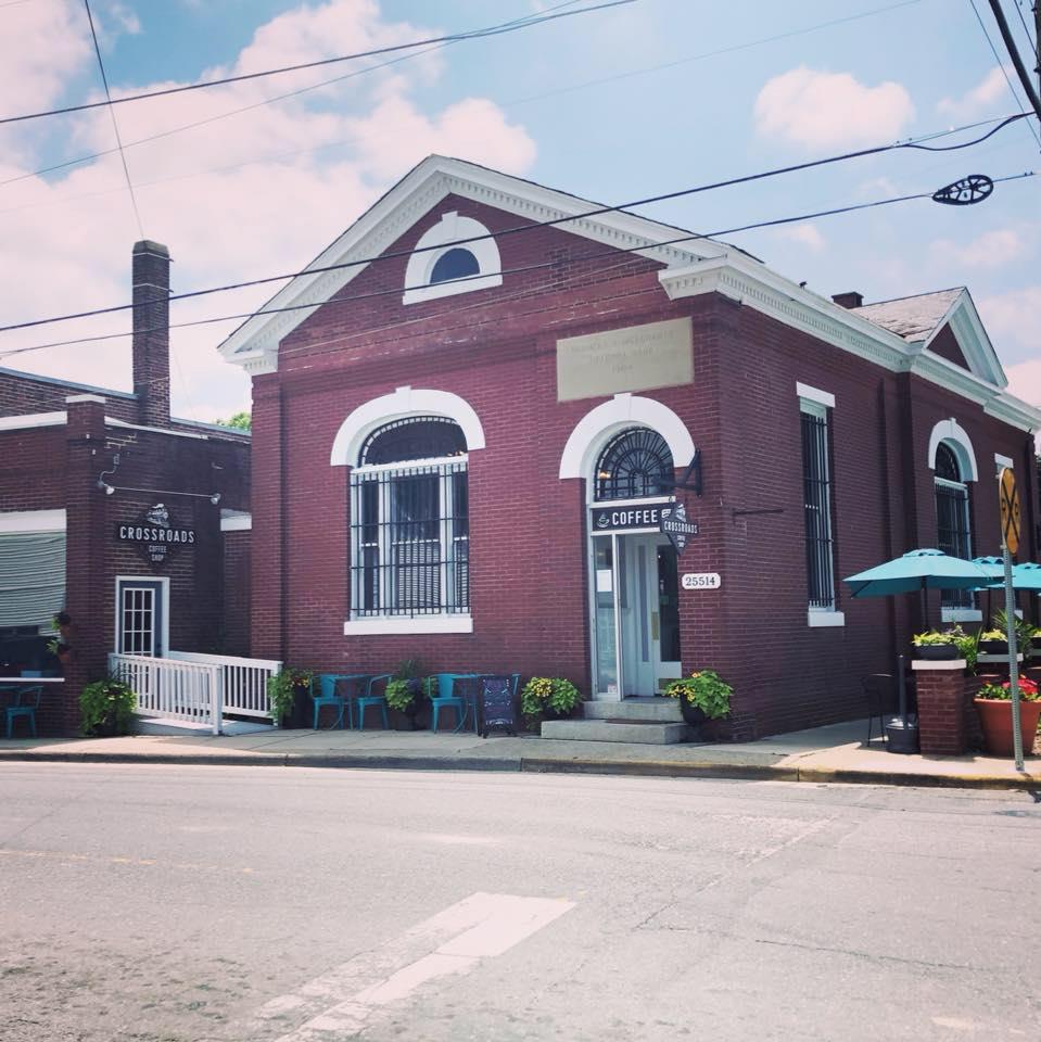 Owner is willing to hold the financing on this property, please inquire for details. Completely restored historical Farmers and Merchants National Bank of Onley circa 1904 & the Western Union building circa 1914. These buildings were the home to Crossroads Coffee Shop, LLC, and now currently leased out to the ES public library for 1600 a month. You will find 3 vaults, with original doors, original safe that has also been restored. There is a very attractive privacy brick wall/outdoor seating area which include tables, chairs, and umbrellas. This building/business is turnkey and the owners are willing to hold the financing so long as the terms are met. Riptide Real Estate, LLC is owner/ VA real estate broker.