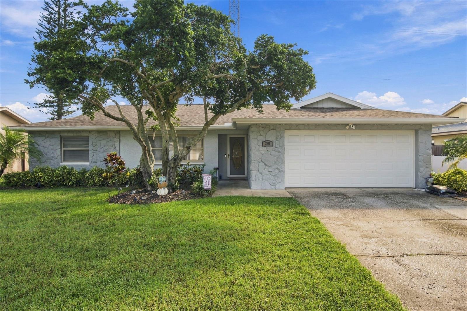 Well here we go! Beautifully maintained 3-bedroom, 2-bathroom single-family pool home with a screened enclosure, offering the perfect blend of comfort, functionality, and Florida living.Inside, the open-concept floor plan features durable porcelain tile plank flooring, quartz countertops, stainless appliances, a spacious living area, and a seamless flow into the dining room and kitchen, complete with a cozy wood-burning fireplace—creating an inviting atmosphere for both everyday living and entertaining.French doors lead to your private screened lanai, where a sparkling saltwater pool, travertine-style deck, and fully fenced backyard create your own private outdoor retreat. The screened enclosure allows you to enjoy outdoor living year-round while helping keep maintenance to a minimum.Roof installed in 2018 provides added peace of mind, while the absence of an HOA means no monthly association fees or restrictive community rules.Conveniently located near Clearwater’s shopping, dining, parks, golf, and world-famous Gulf beaches, this home offers an exceptional opportunity to enjoy the Florida lifestyle. Don’t miss the chance to make this beautifully maintained pool home your own!