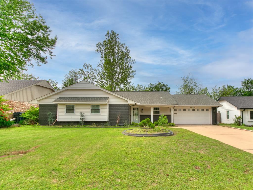 This recently updated home, conveniently located near shops, healthcare, and restaurants, showcases its charm inside and out. Updates include a built-on flex room, paint on the interior and exterior, floor coverings, appliances, fixtures, and countertops. Stepping through the front door, you are greeted by a large open living space that features a wood trim accent wall, painted brick gas fireplace, and large window to the backyard that allows the space to be lit by an abundance of sunlight. A hidden bookcase door in the living room leads you to a private flex room, with garage access as well, that is perfect for a work-from-home office or hobby room. The kitchen includes updates of quartz counters and recently replaced appliances such as a dishwasher and oven cooktop. The primary bedroom features two closets, built-in dresser, and a remodeled bathroom with walk-in shower. The second bathroom follows suit with an updated bathtub, fixtures, and quartz counters. The backyard includes a storage shed and is lined with flower beds, making for the perfect outdoor retreat as it is shaded nicely in the warm summer months by a beautiful mature tree. Best location!