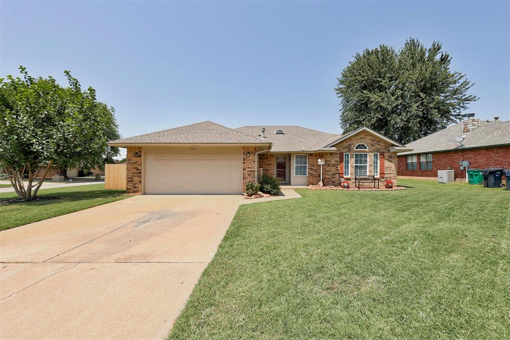 This light-filled & beautifully updated residence in the heart of Edmond features soaring ceilings, timeless finishes, & an inviting open layout that creates the perfect blend of comfort & style. The spacious living room is the heart of the home w/ updated flooring that flows throughout the home, a classic gas fireplace that adds warmth & character, w/ an open design that makes entertaining effortless. The adjoining dining room is bathed in natural light from an oversized bay window overlooking the lush backyard & offers direct access to the patio, extending your living space. Just beyond, the beautifully updated kitchen is designed w/ both function & style in mind, featuring granite countertops, a timeless subway tile backsplash, stainless steel appliances (new gas range), a built-in microwave, abundant upper & lower cabinetry, bar-top seating for casual dining or gathering with guests, a deep basin sink & a Bosch stainless steel dishwasher that makes cleanup a breeze. Privately situated on its own side of the home, the spacious primary suite offers a peaceful retreat w/ soaring ceilings, abundant natural light, & plenty of room to unwind. The en-suite bathroom boasts dual walk-in closets, a spacious shower, private water closet & a double vanity topped w/ granite countertops, creating a timeless & functional space. 3 generously sized secondary bedrooms feature updated flooring, high ceilings, spacious closets & sizable windows that fill each room w/ natural light. The 4th bedroom offers exceptional flexibility, making it ideal as a nursery, guest room, or home office to fit your lifestyle. The secondary bathroom has been tastefully updated w/ a spacious vanity, modern lighting, updated flooring & timeless cabinetry. Outside, the backyard offers endless opportunities to relax & entertain, complete w/a spacious patio perfect for hosting family & friends or enjoying peaceful evenings in your own private outdoor retreat. Class 4 Shingle and NEW Lennox HVAC system!