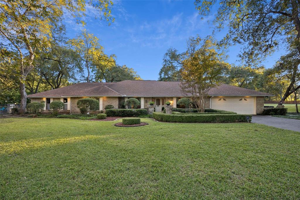 Tucked quietly within an intimate cul-de-sac, this custom-built, single-owner residence is one of Dallas’ true hidden gems, set on a breathtaking 1.3-acre creek lot overlooking the historic Golf Club of Dallas. Wynnewood Hills has long been one of Dallas’s best kept secrets, and as you drive up you will see why! Surrounded by mature trees and sweeping golf course views, the setting offers rare privacy and tranquility—just 15 minutes from Downtown Dallas. The 3,679-square-foot, single-level home blends timeless craftsmanship with thoughtful updates completed over the past decade, including renovated kitchen and baths, newer roof and HVAC, and all-new PVC plumbing. Inside, white oak hardwoods flow throughout, complemented by a marble entry, abundant natural light, and custom white oak cabinetry. Stone fireplaces anchor both the den and primary suite, adding warmth and architectural character. Designed to age in place, this home features discrete ADA-friendly enhancements as well option for a second primary suite for multi-generational living. The primary suite is a true retreat with separate seating area, a Roman-style sunken tub, oversized cultured-marble shower, and quartz vanities. The backyard must be experienced to be fully appreciated—an expansive, park-like setting offering rare tranquility and total privacy. Simply put, this is one of the most peaceful and extraordinary lots you’ll find within the city limits.
