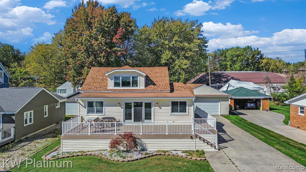 Waterfront Paradise on Harsens Island!Experience life on the South Channel of the St. Clair River with this beautifully updated 4-bedroom split-level colonial featuring 65 feet of prime waterfront and breathtaking views of passing freighters, Walpole Island, and endless boating & fishing opportunities.Step inside to find a bright, open layout with plenty of natural light and comfortable living spaces — ideal for entertaining or relaxing after a day on the water. Enjoy peace of mind with newer dimensional roofing, vinyl siding, gutters, Anderson windows, Trex decking, and a whole-house generator for year-round reliability.Outdoors, the property truly shines — complete with an extra-deep steel seawall, dock with a 10,000-lb boat hoist and electricity, and a 4-car detached garage offering tons of storage for vehicles, boats, and toys. Whether you’re watching freighters drift by, casting a line for the day’s catch, or hosting friends on your deck at sunset, this home offers the ultimate island lifestyle. Includes a 1 year Americas Preferred home warranty.